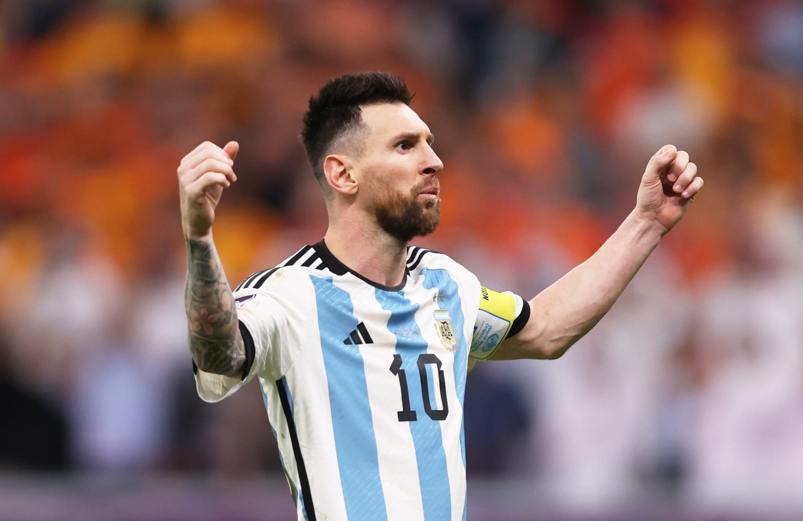 LUSAIL CITY, QATAR - DECEMBER 09: Lionel Messi of Argentina celebrates scoring the team's first penalty in the penalty shoot out during the FIFA World Cup Qatar 2022 quarter final match between Netherlands and Argentina at Lusail Stadium on December 09, 2022 in Lusail City, Qatar. (Photo by Julian Finney/Getty Images)