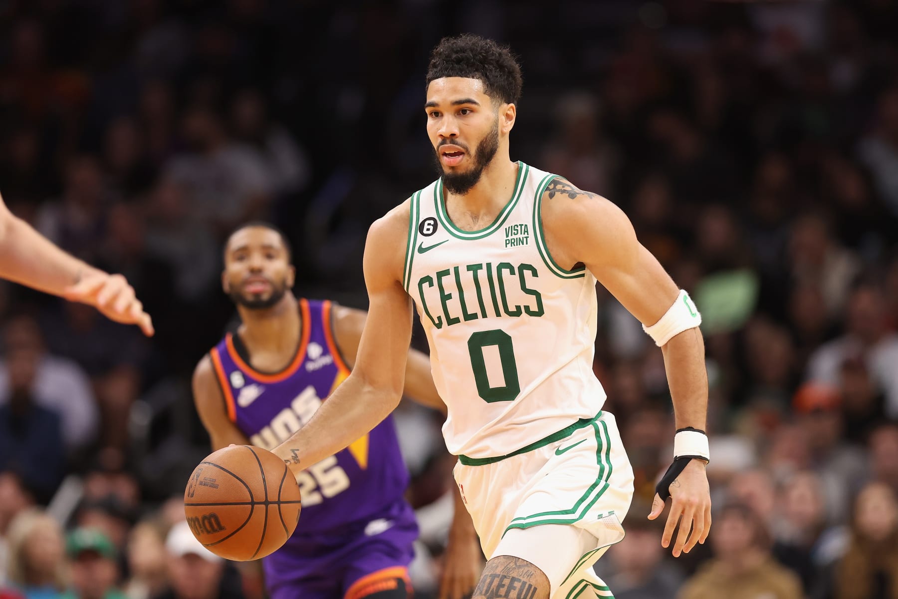 PHOENIX, ARIZONA - DECEMBER 07: Jayson Tatum #0 of the Boston Celtics handles the ball during the first half of the NBA game against the Phoenix Suns at Footprint Center on December 07, 2022 in Phoenix, Arizona. NOTE TO USER: User expressly acknowledges and agrees that, by downloading and or using this photograph, User is consenting to the terms and conditions of the Getty Images License Agreement. (Photo by Christian Petersen/Getty Images) PHOENIX, ARIZONA - DECEMBER 07: Jayson Tatum #0 of the Boston Celtics handles the ball during the first half of the NBA game against the Phoenix Suns at Footprint Center on December 07, 2022 in Phoenix, Arizona. NOTE TO USER: User expressly acknowledges and agrees that, by downloading and or using this photograph, User is consenting to the terms and conditions of the Getty Images License Agreement. (Photo by Christian Petersen/Getty Images)