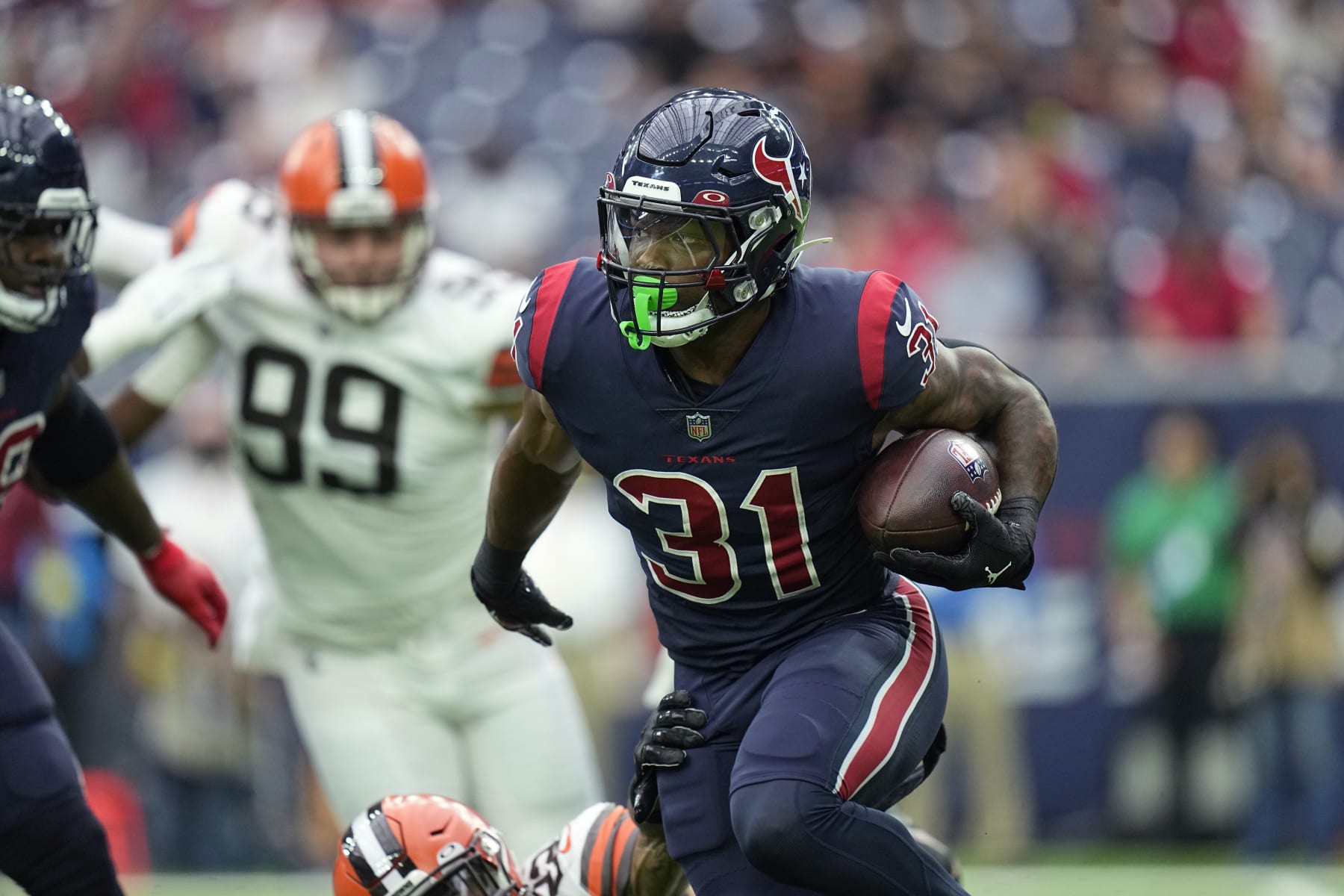 Houston Texans running back Dameon Pierce (31) runs against the Cleveland Browns during the first half of an NFL football game in Houston, Sunday, Dec. 4, 2022, in Houston. (AP Photo/Eric Gay) Houston Texans running back Dameon Pierce (31) runs against the Cleveland Browns during the first half of an NFL football game in Houston, Sunday, Dec. 4, 2022, in Houston. (AP Photo/Eric Gay)