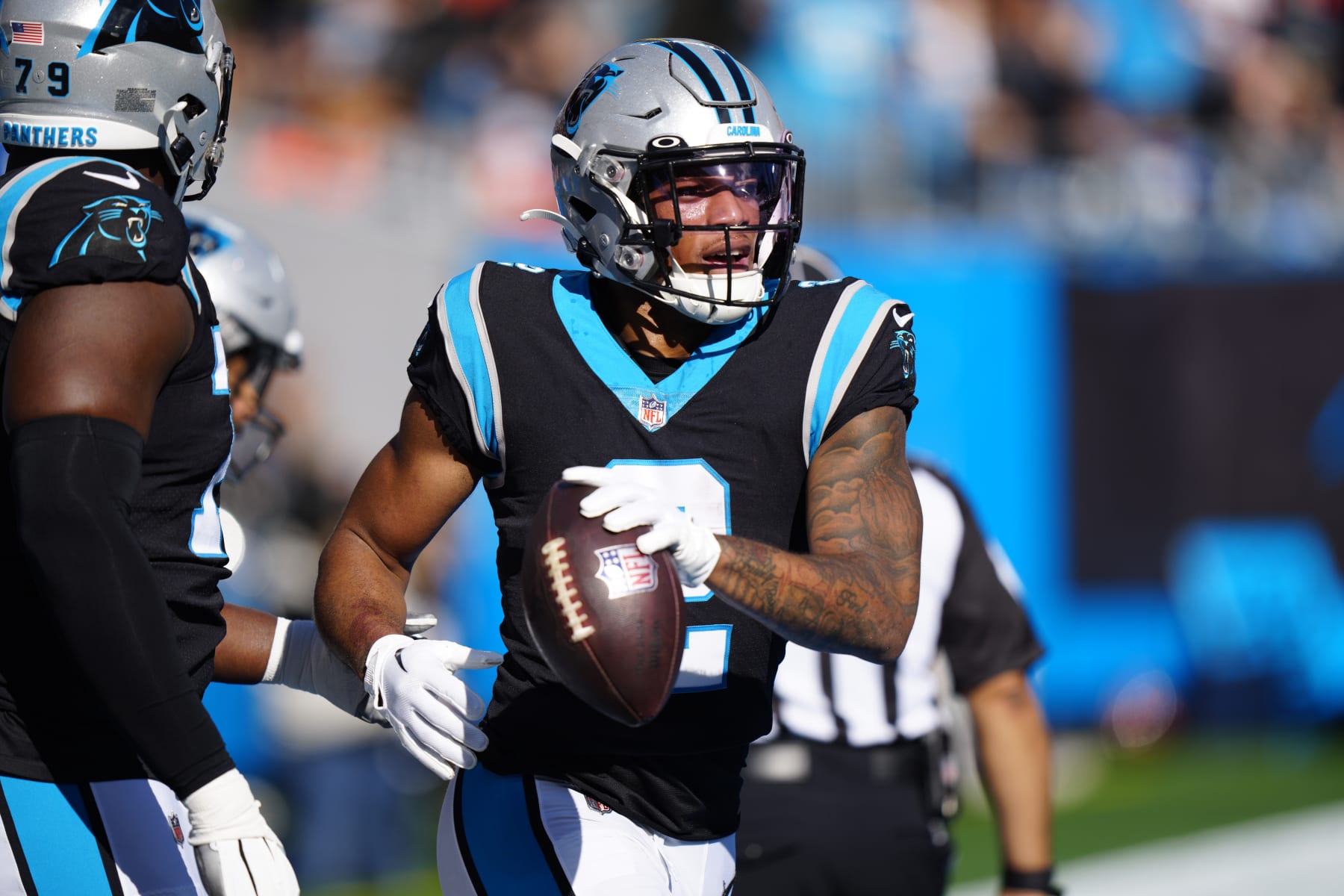 Carolina Panthers wide receiver DJ Moore celebrates after scoring during the first half of an NFL football game between the Carolina Panthers and the Denver Broncos on Sunday, Nov. 27, 2022, in Charlotte, N.C. (AP Photo/Jacob Kupferman) Carolina Panthers wide receiver DJ Moore celebrates after scoring during the first half of an NFL football game between the Carolina Panthers and the Denver Broncos on Sunday, Nov. 27, 2022, in Charlotte, N.C. (AP Photo/Jacob Kupferman)