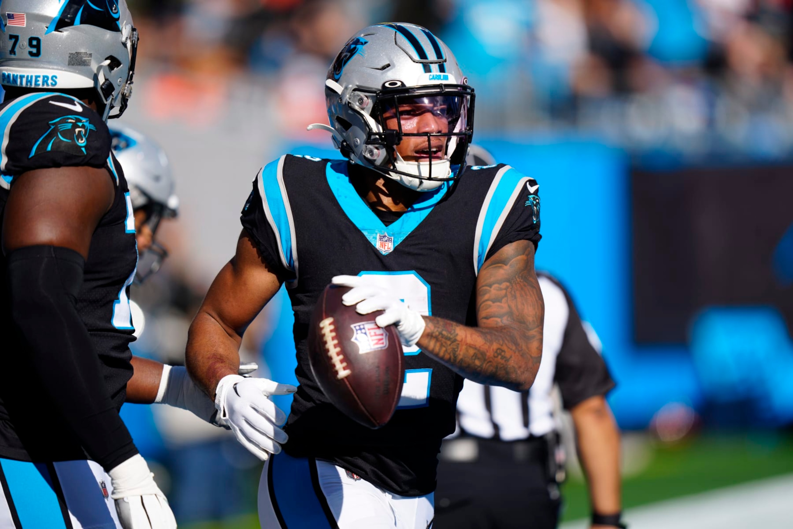 Carolina Panthers wide receiver DJ Moore celebrates after scoring during the first half of an NFL football game between the Carolina Panthers and the Denver Broncos on Sunday, Nov. 27, 2022, in Charlotte, N.C. (AP Photo/Jacob Kupferman)
