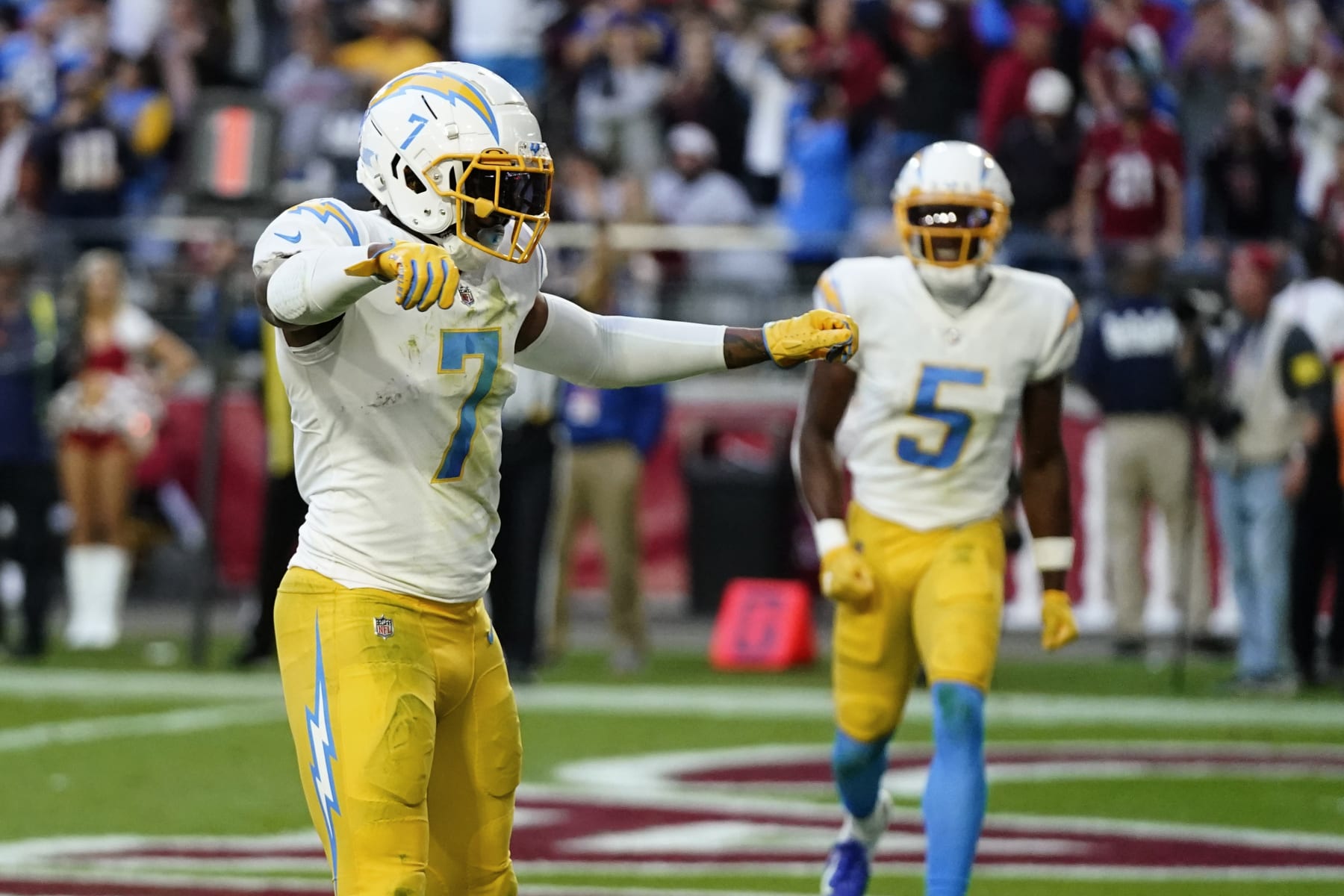 Los Angeles Chargers tight end Gerald Everett (7) celebrates his game-winning two-point conversion during the second half of an NFL football game against the Arizona Cardinals, Sunday, Nov. 27, 2022, in Glendale, Ariz. The Chargers defeated the Cardinals 25-24. (AP Photo/Ross D. Franklin) Los Angeles Chargers tight end Gerald Everett (7) celebrates his game-winning two-point conversion during the second half of an NFL football game against the Arizona Cardinals, Sunday, Nov. 27, 2022, in Glendale, Ariz. The Chargers defeated the Cardinals 25-24. (AP Photo/Ross D. Franklin)