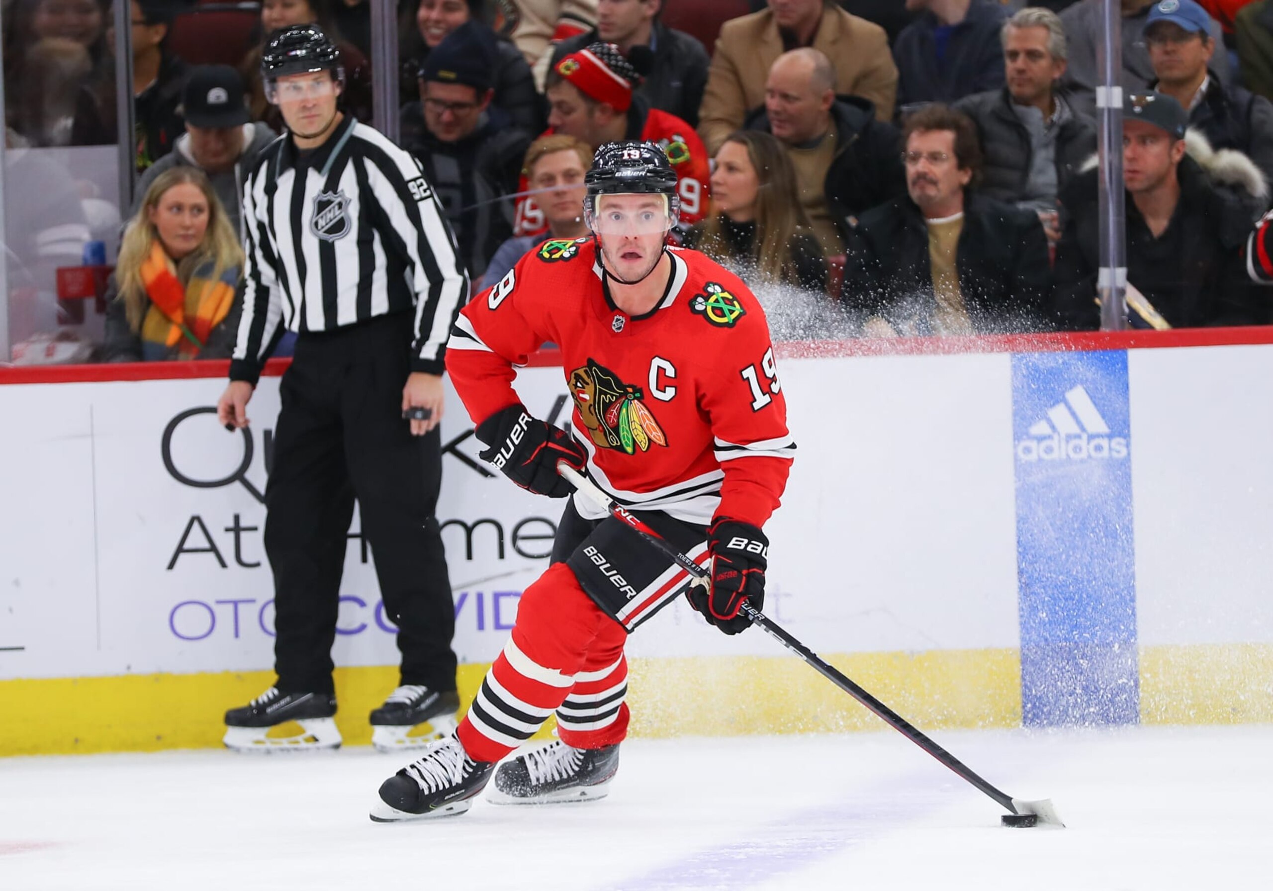 CHICAGO, IL - NOVEMBER 30: Chicago Blackhawks Center Jonathan Toews (19) skates with the puck in action
during a game between the Edmonton Oilers and the Chicago Blackhawks on November 30, 2022 at the United Center in Chicago, IL. (Photo by Melissa Tamez/Icon Sportswire via Getty Images) CHICAGO, IL - NOVEMBER 30: Chicago Blackhawks Center Jonathan Toews (19) skates with the puck in action
during a game between the Edmonton Oilers and the Chicago Blackhawks on November 30, 2022 at the United Center in Chicago, IL. (Photo by Melissa Tamez/Icon Sportswire via Getty Images)