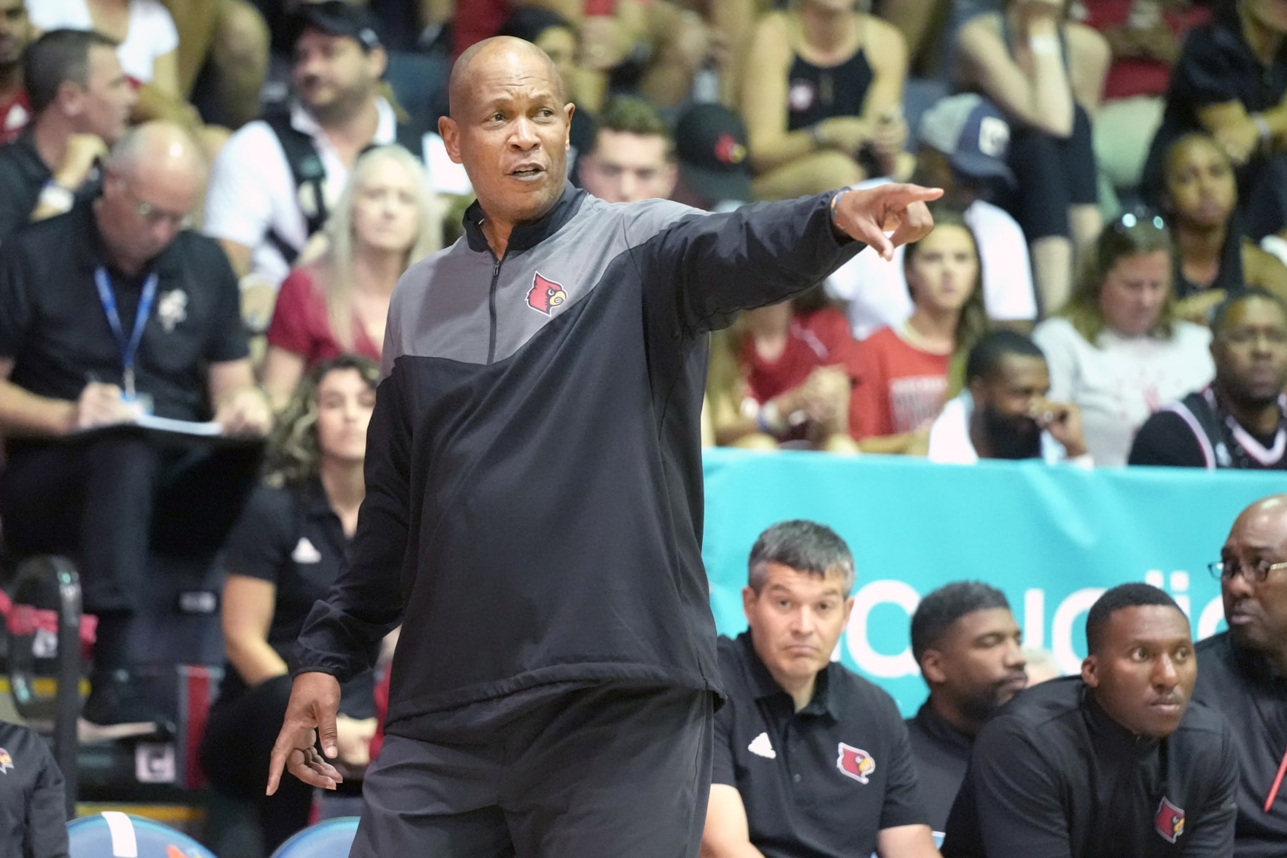 LAHAINA, HI - NOVEMBER 23:  Head coach Kenny Payne of the Louisville Cardinals signals to his players during the seventh place game of the Maui Jim Invitational college basketball Tournament against the Cincinnati Bearcats at Lahaina Civic Arena on November 23, 2022 in Lahaina, Hawaii.  (Photo by Mitchell Layton/Getty Images)
