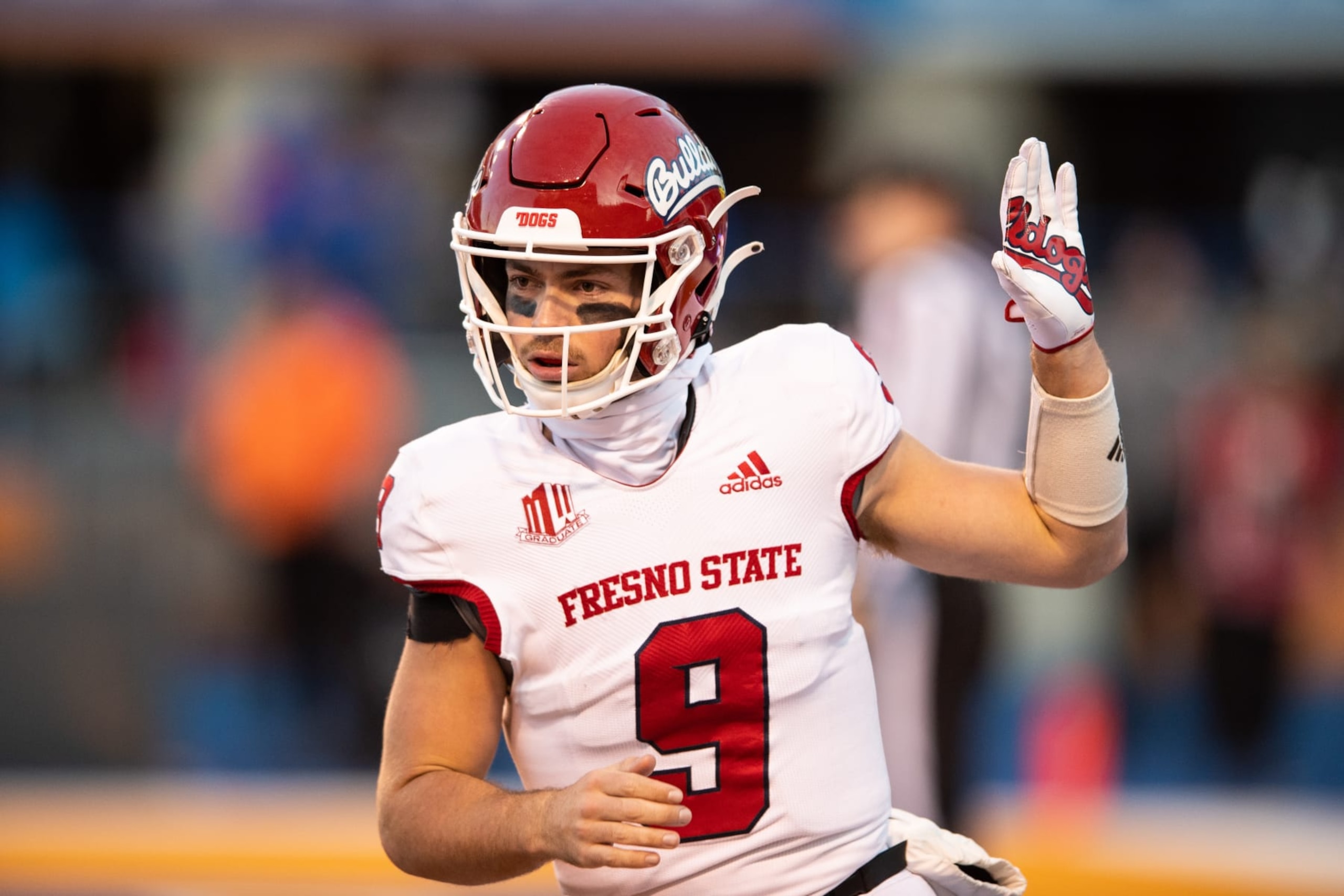 BOISE, ID - DECEMBER 03: Fresno State Bulldogs quarterback Jake Haener (9) on the field during a college football game between the Fresno State Bulldogs and the Boise State Broncos on December 3, 2022, at Albertsons Stadium in Boise, ID. (Photo by Tyler Ingham/Icon Sportswire via Getty Images) BOISE, ID - DECEMBER 03: Fresno State Bulldogs quarterback Jake Haener (9) on the field during a college football game between the Fresno State Bulldogs and the Boise State Broncos on December 3, 2022, at Albertsons Stadium in Boise, ID. (Photo by Tyler Ingham/Icon Sportswire via Getty Images)