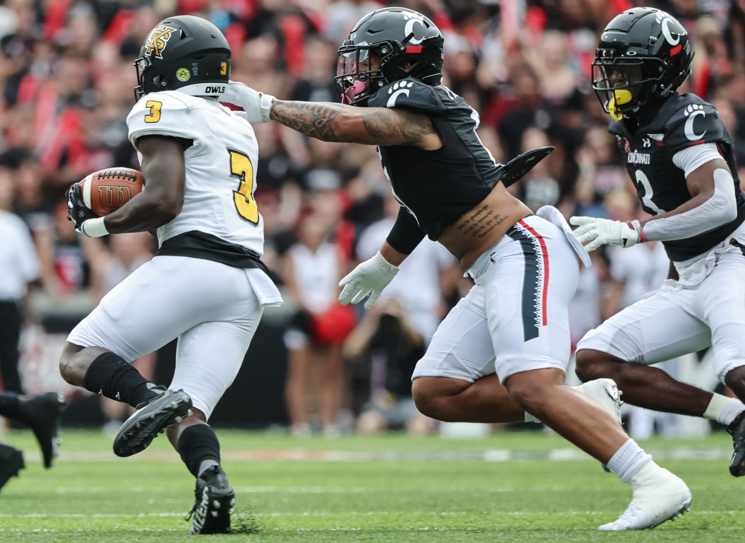 CINCINNATI, OH - SEPTEMBER 10: Ivan Pace Jr. #0 of the Cincinnati Bearcats pursues Nykeem Farrow #3 of the Kennesaw State Owls during the game at Nippert Stadium on September 10, 2022 in Cincinnati, Ohio. (Photo by Michael Hickey/Getty Images) CINCINNATI, OH - SEPTEMBER 10: Ivan Pace Jr. #0 of the Cincinnati Bearcats pursues Nykeem Farrow #3 of the Kennesaw State Owls during the game at Nippert Stadium on September 10, 2022 in Cincinnati, Ohio. (Photo by Michael Hickey/Getty Images)
