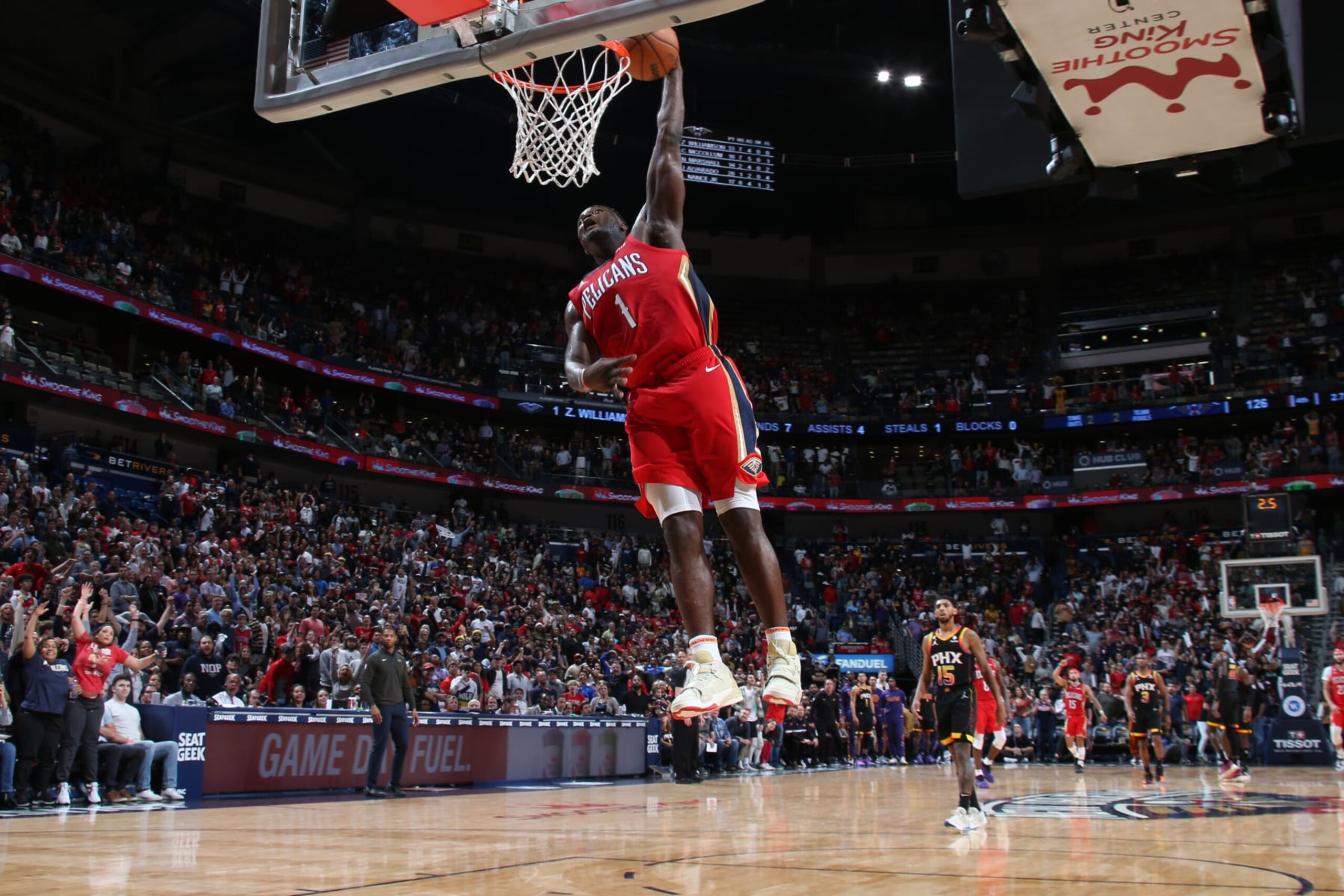NEW ORLEANS, LA - DECEMBER 9: Zion Williamson #1 of the New Orleans Pelicans dunks the ball during the game against the Phoenix Suns on December 9, 2022 at the Smoothie King Center in New Orleans, Louisiana. NOTE TO USER: User expressly acknowledges and agrees that, by downloading and or using this Photograph, user is consenting to the terms and conditions of the Getty Images License Agreement. Mandatory Copyright Notice: Copyright 2022 NBAE (Photo by Layne Murdoch Jr./NBAE via Getty Images)