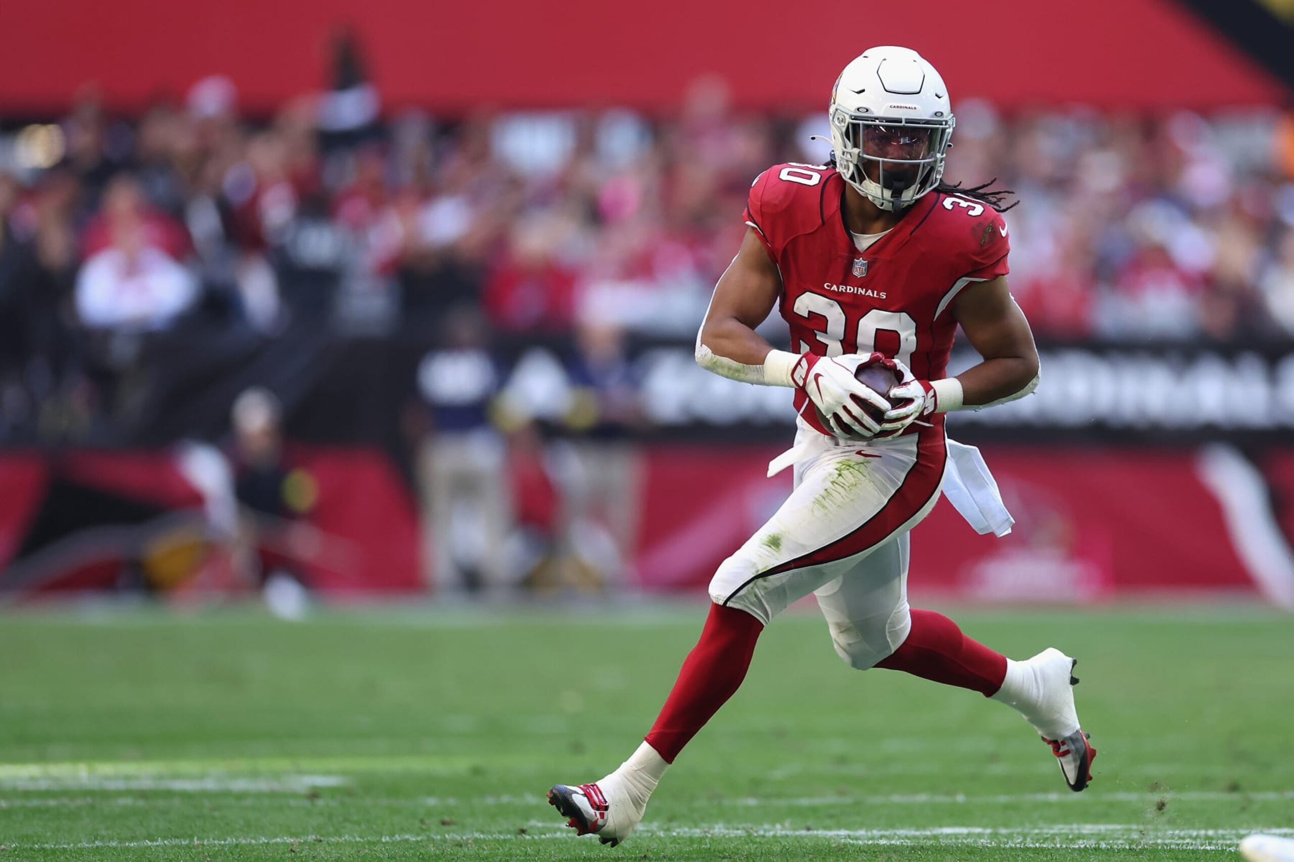 GLENDALE, ARIZONA - NOVEMBER 27: Running back Keaontay Ingram #30 of the Arizona Cardinals rushes the football against the Los Angeles Chargers during the NFL game at State Farm Stadium on November 27, 2022 in Glendale, Arizona. The Chargers defeated the Cardinals 25-24. (Photo by Christian Petersen/Getty Images) GLENDALE, ARIZONA - NOVEMBER 27: Running back Keaontay Ingram #30 of the Arizona Cardinals rushes the football against the Los Angeles Chargers during the NFL game at State Farm Stadium on November 27, 2022 in Glendale, Arizona. The Chargers defeated the Cardinals 25-24. (Photo by Christian Petersen/Getty Images)