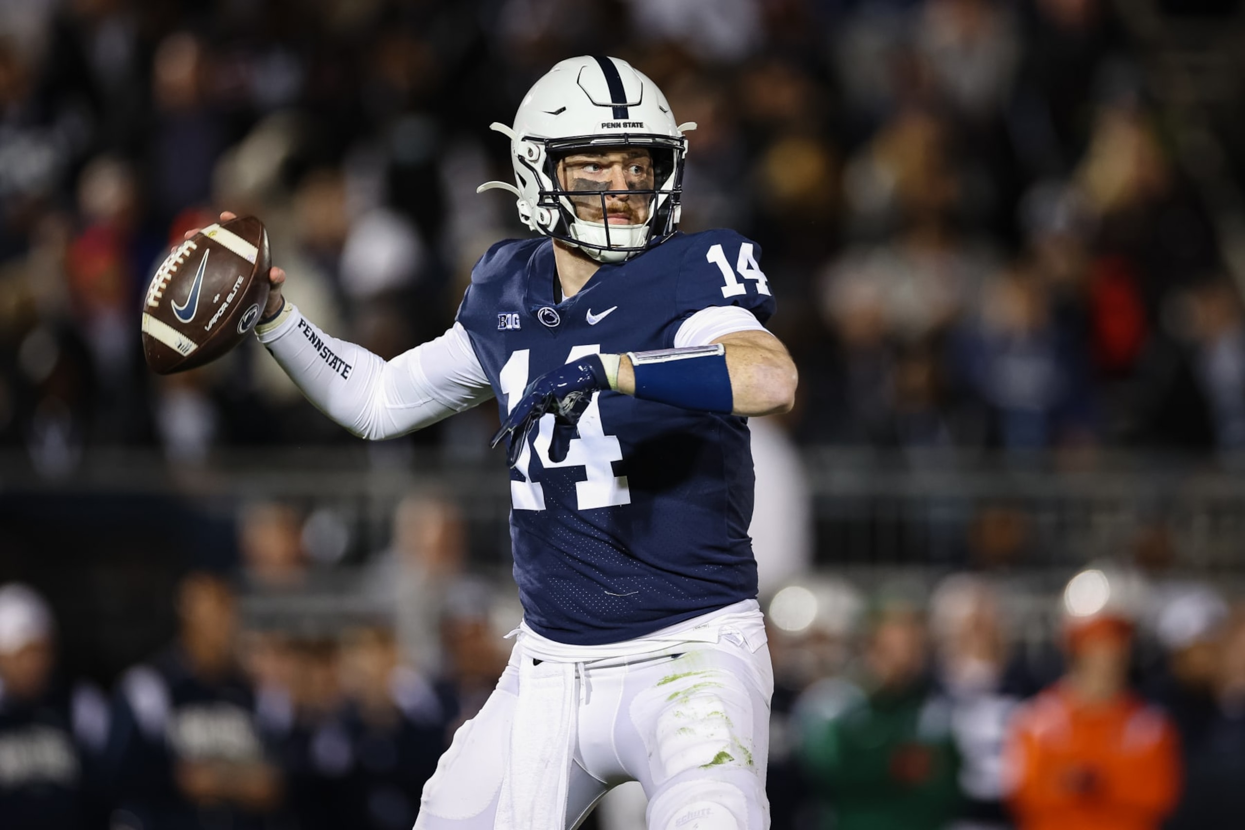 STATE COLLEGE, PA - NOVEMBER 26: Sean Clifford #14 of the Penn State Nittany Lions attempts a pass against the Michigan State Spartans during the second half at Beaver Stadium on November 26, 2022 in State College, Pennsylvania. (Photo by Scott Taetsch/Getty Images)