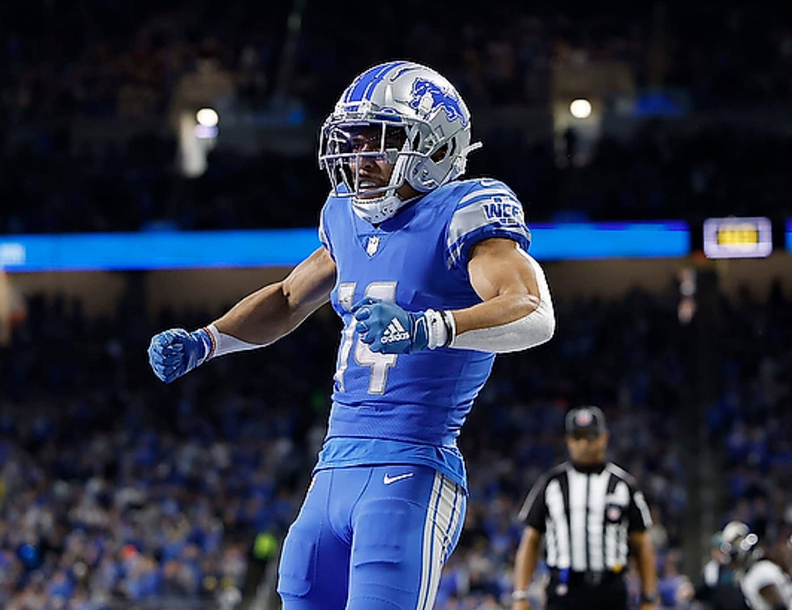 DETROIT, MI - DECEMBER 4: Amon-Ra St. Brown #14 of the Detroit Lions celebrates a touchdown during the game against the Jacksonville Jaguars at Ford Field on December 4, 2022 in Detroit, Michigan. Detroit defeated Jacksonville 40-14. (Photo by Leon Halip/Getty Images)