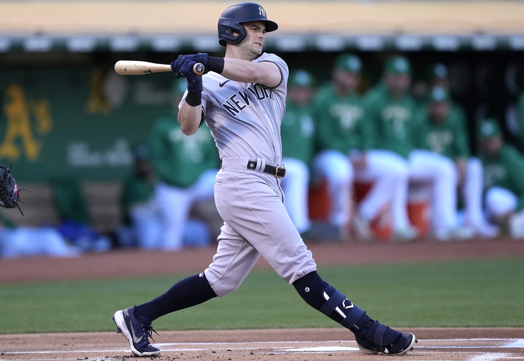 OAKLAND, CALIFORNIA - AUGUST 27: Andrew Benintendi #18 of the New York Yankees bats against the Oakland Athletics in the top of the first inning at RingCentral Coliseum on August 27, 2022 in Oakland, California. (Photo by Thearon W. Henderson/Getty Images)