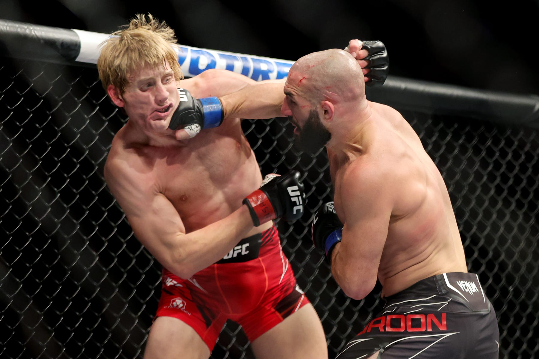 LAS VEGAS, NEVADA - DECEMBER 10: (R-L) Jared Gordon punches Paddy Pimblett of England in a lightweight fight during the UFC 282 event at T-Mobile Arena on December 10, 2022 in Las Vegas, Nevada. (Photo by Carmen Mandato/Zuffa LLC)
