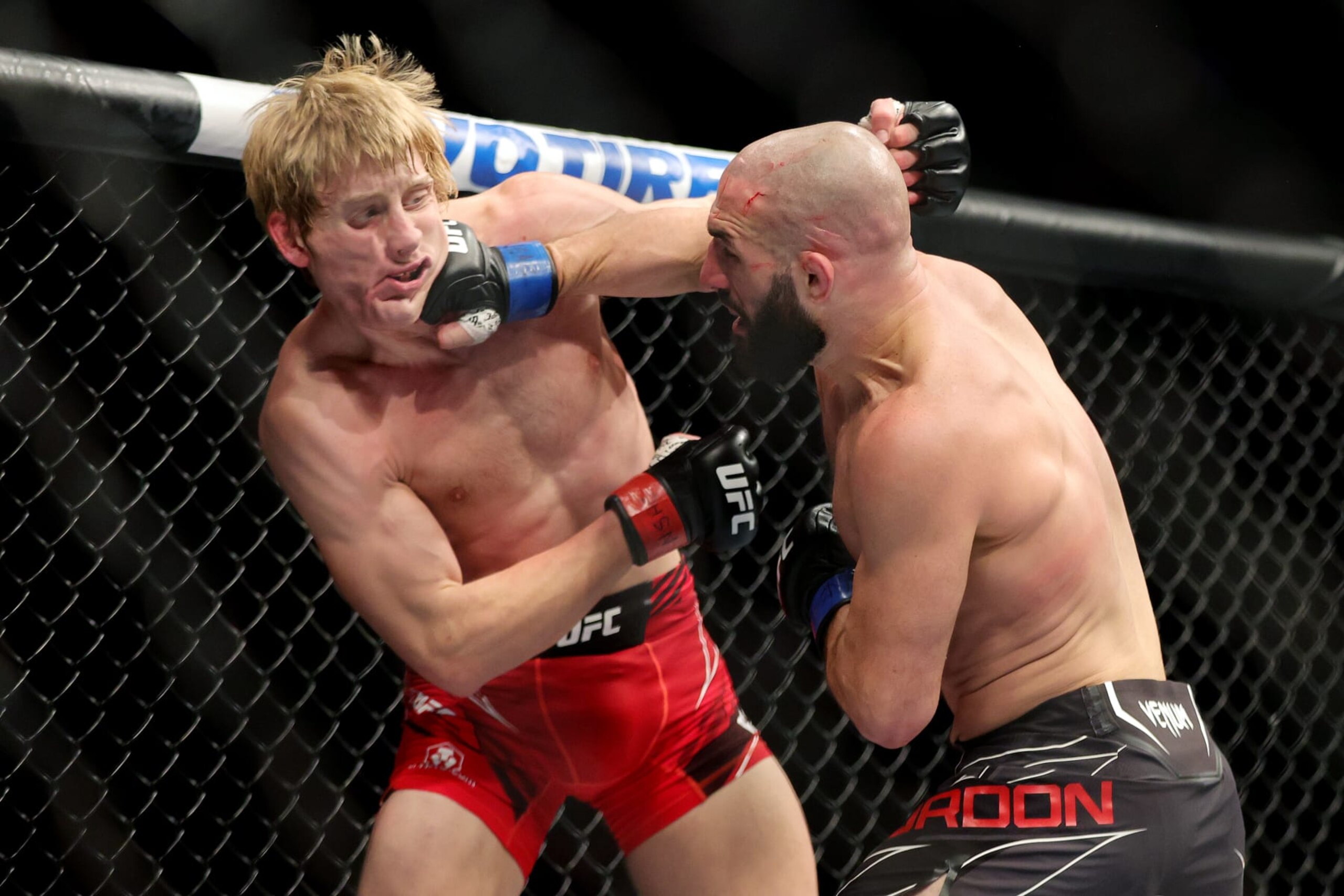 LAS VEGAS, NEVADA - DECEMBER 10: (R-L) Jared Gordon punches Paddy Pimblett of England in a lightweight fight during the UFC 282 event at T-Mobile Arena on December 10, 2022 in Las Vegas, Nevada. (Photo by Carmen Mandato/Zuffa LLC)