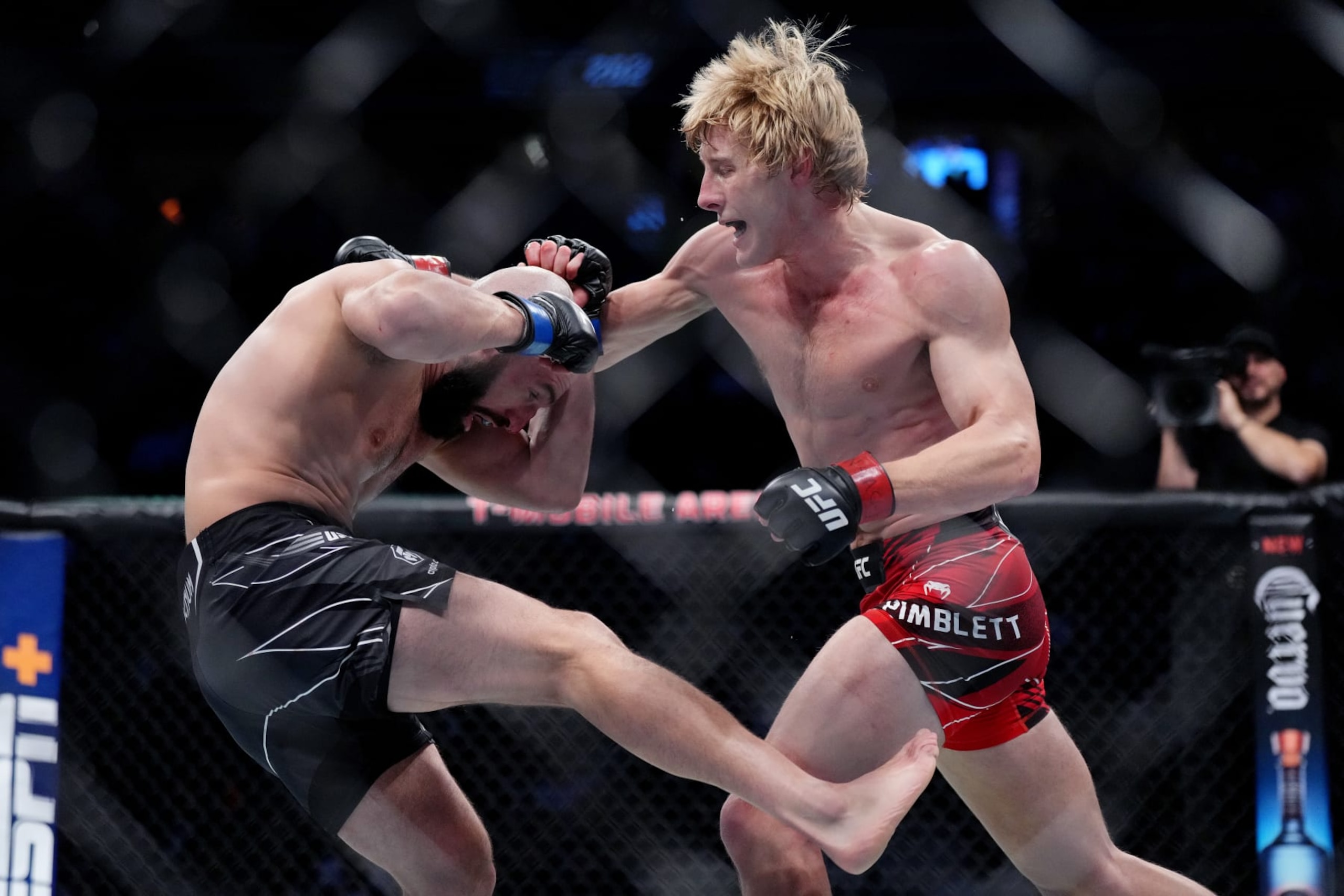 LAS VEGAS, NEVADA - DECEMBER 10: (R-L) Paddy Pimblett of England punches Jared Gordon in a lightweight fight during the UFC 282 event at T-Mobile Arena on December 10, 2022 in Las Vegas, Nevada. (Photo by Cooper Neill/Zuffa LLC)