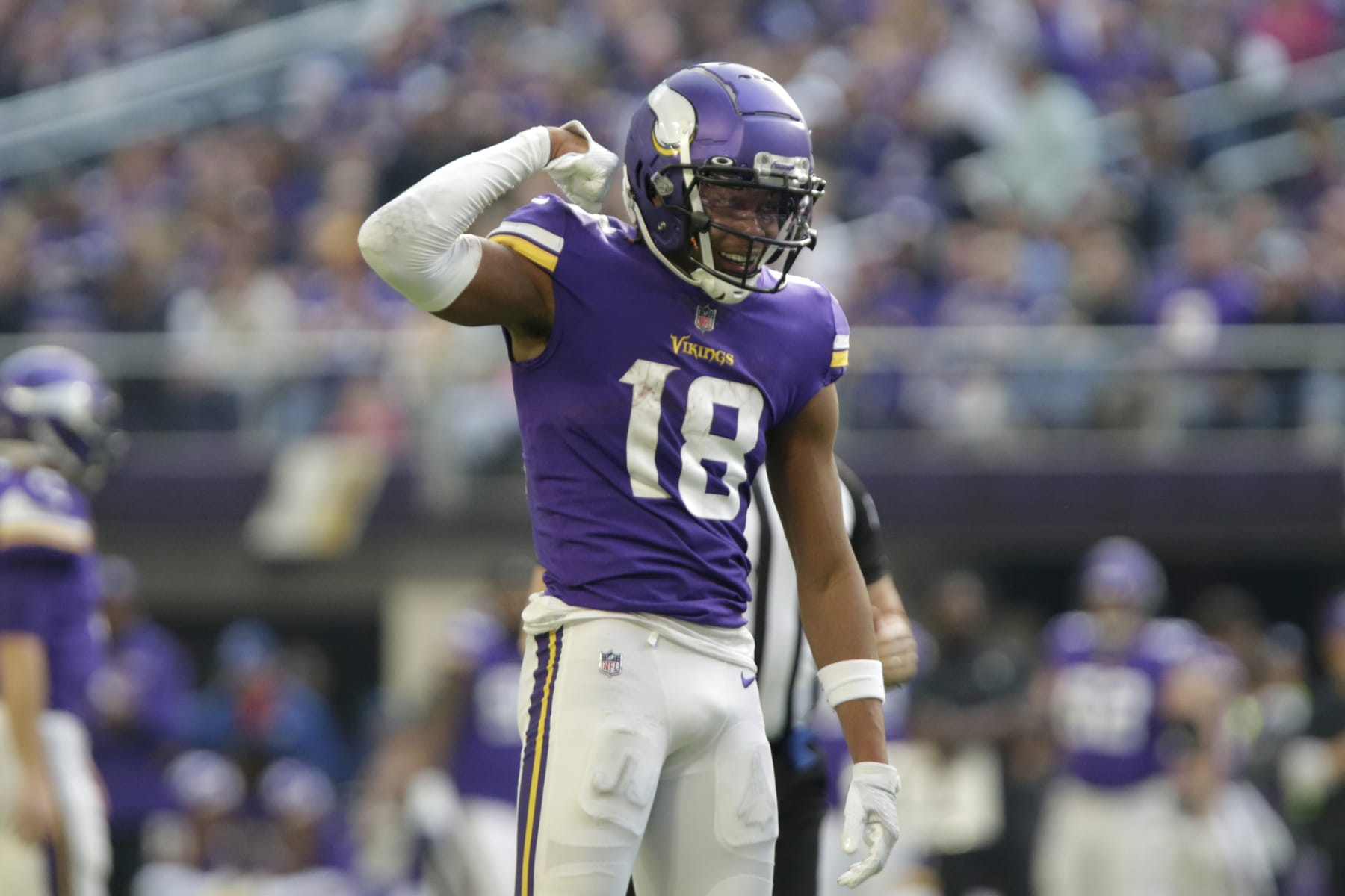 Minnesota Vikings wide receiver Justin Jefferson (18) celebrates after catching a pass for a first down during the first half of an NFL football game against the New York Jets, Sunday, Dec. 4, 2022, in Minneapolis. (AP Photo/Andy Clayton-King)