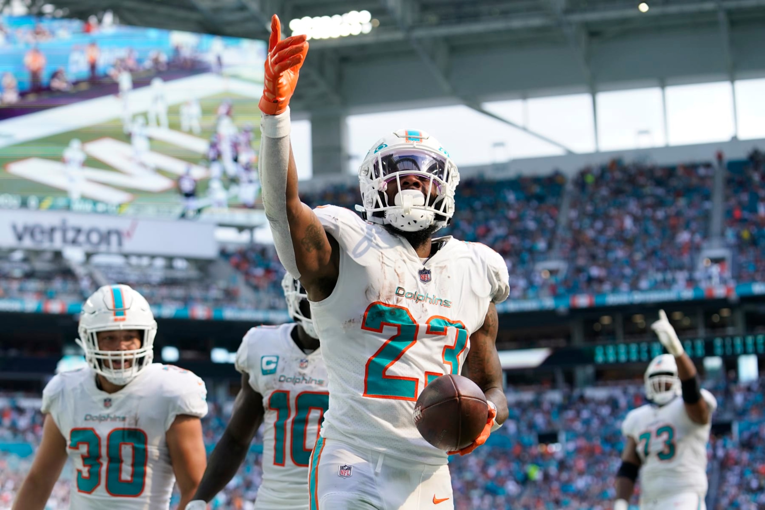 Miami Dolphins running back Jeff Wilson Jr. (23) celebrates his touchdown during the first half of an NFL football game against the Houston Texans, Sunday, Nov. 27, 2022, in Miami Gardens, Fla. (AP Photo/Lynne Sladky) Miami Dolphins running back Jeff Wilson Jr. (23) celebrates his touchdown during the first half of an NFL football game against the Houston Texans, Sunday, Nov. 27, 2022, in Miami Gardens, Fla. (AP Photo/Lynne Sladky)