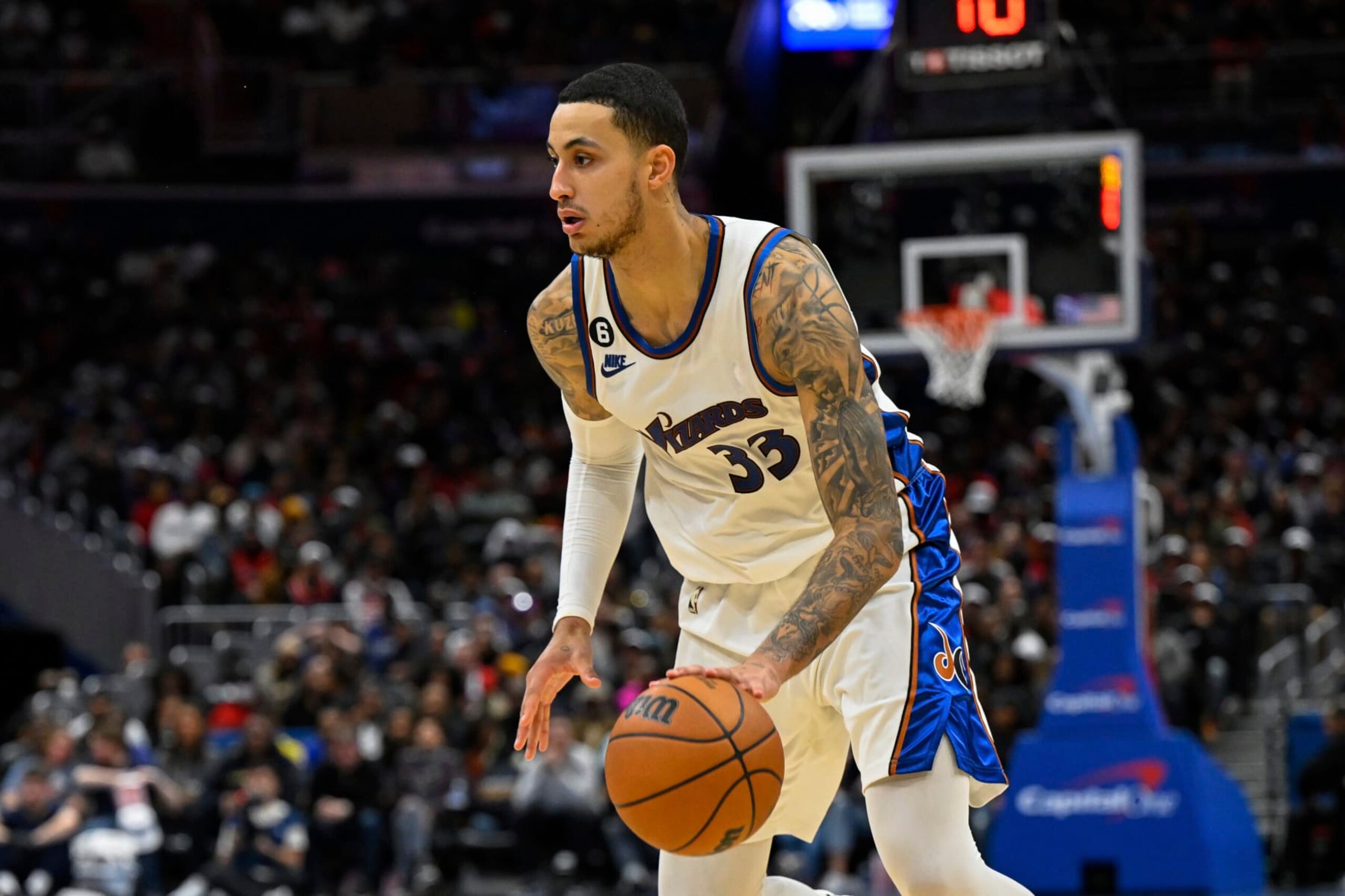 Washington Wizards forward Kyle Kuzma (33) handles the ball during the second half of an NBA basketball game against the Los Angeles Clippers, Saturday, Dec. 10, 2022, in Washington. (AP Photo/Terrance Williams)