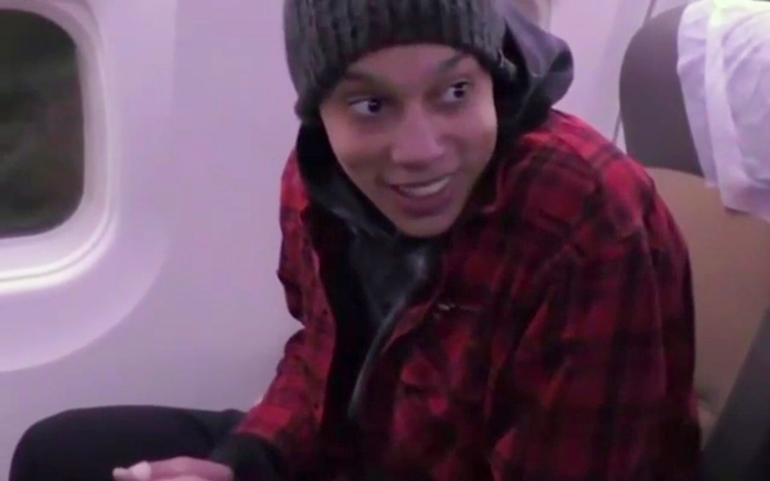In this image made from video provided by Russian Federal Security Service, WNBA star and two-time Olympic gold medalist Brittney Griner sits in the plane as she flies to Abu Dhabi to be exchanged for Russian citizen Viktor Bout, in Russia, Friday, Dec. 9, 2022. (Russian Federal Security Service via AP) In this image made from video provided by Russian Federal Security Service, WNBA star and two-time Olympic gold medalist Brittney Griner sits in the plane as she flies to Abu Dhabi to be exchanged for Russian citizen Viktor Bout, in Russia, Friday, Dec. 9, 2022. (Russian Federal Security Service via AP)