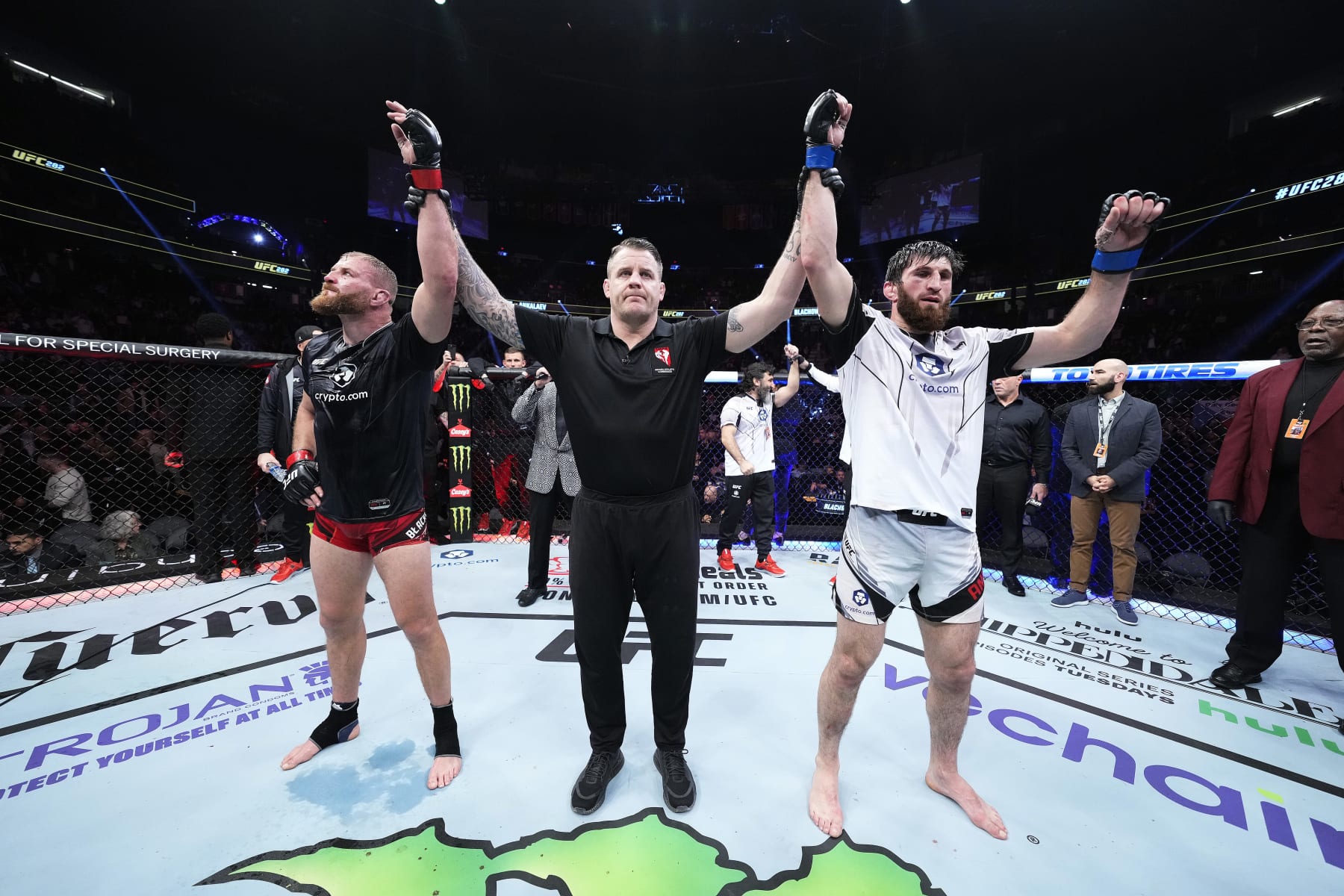 LAS VEGAS, NEVADA - DECEMBER 10: (L-R) Jan Blachowicz of Poland and Magomed Ankalaev of Russia react after their UFC light heavyweight championship fight results in a split draw during the UFC 282 event at T-Mobile Arena on December 10, 2022 in Las Vegas, Nevada. (Photo by Chris Unger/Zuffa LLC)