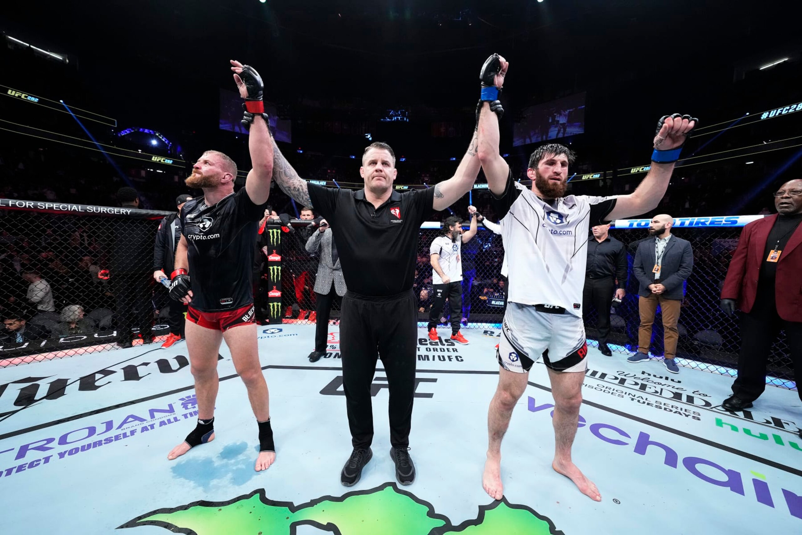 LAS VEGAS, NEVADA - DECEMBER 10: (L-R) Jan Blachowicz of Poland and Magomed Ankalaev of Russia react after their UFC light heavyweight championship fight results in a split draw during the UFC 282 event at T-Mobile Arena on December 10, 2022 in Las Vegas, Nevada. (Photo by Chris Unger/Zuffa LLC)