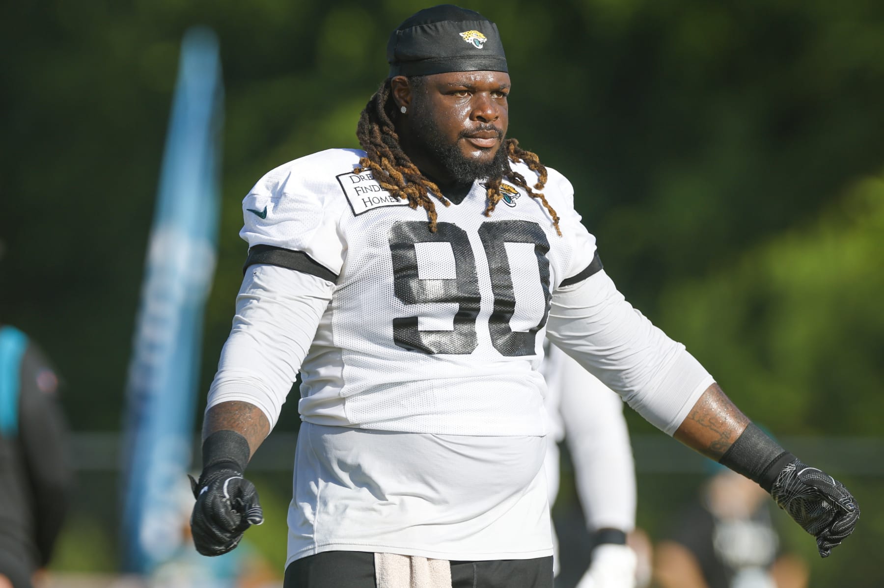 JACKSONVILLE, FL - JULY 28: Jacksonville Jaguars defensive tackle Malcom Brown (90) stretches during training camp on July 28, 2022 at Episcopal School of Jacksonville in Jacksonville, Fl. (Photo by David Rosenblum/Icon Sportswire via Getty Images)