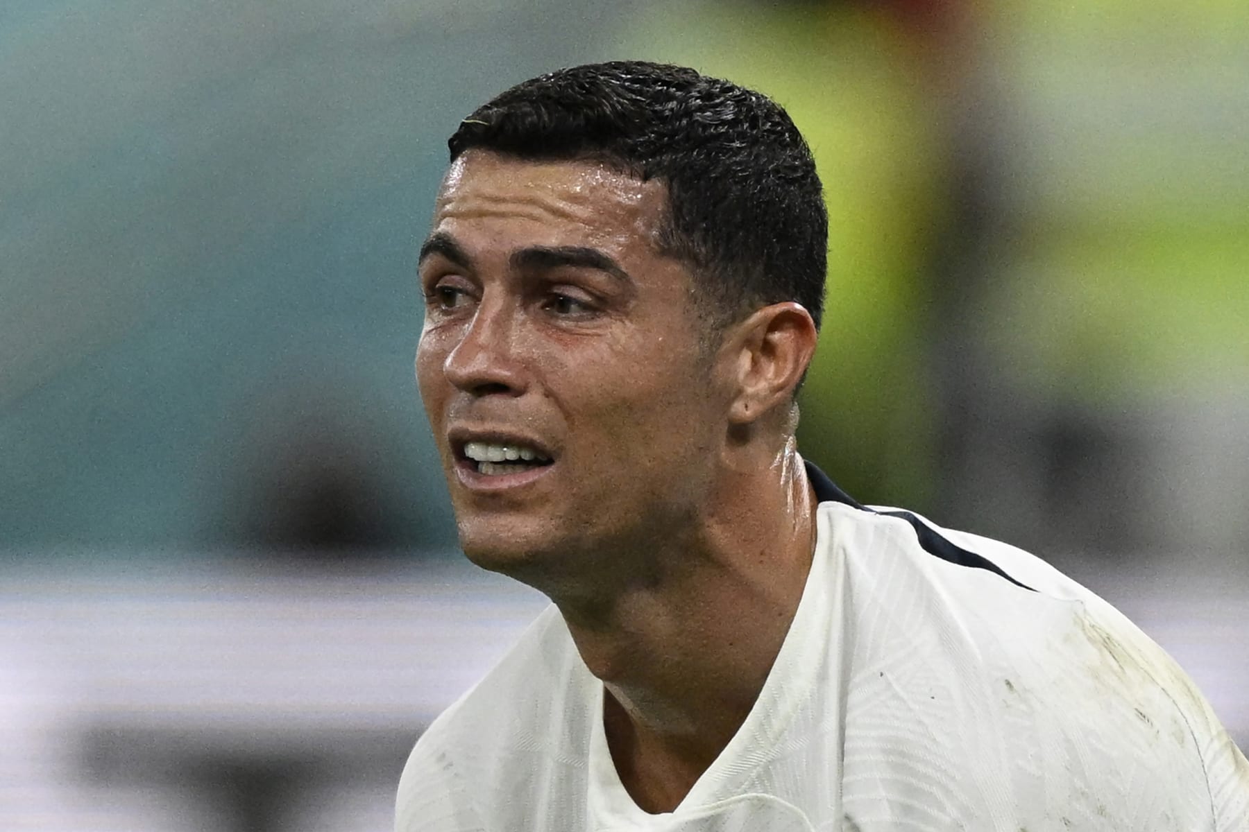 Portugal's forward #07 Cristiano Ronaldo reacts after his team lost the Qatar 2022 World Cup quarter-final football match between Morocco and Portugal at the Al-Thumama Stadium in Doha on December 10, 2022. (Photo by PATRICIA DE MELO MOREIRA / AFP) (Photo by PATRICIA DE MELO MOREIRA/AFP via Getty Images)