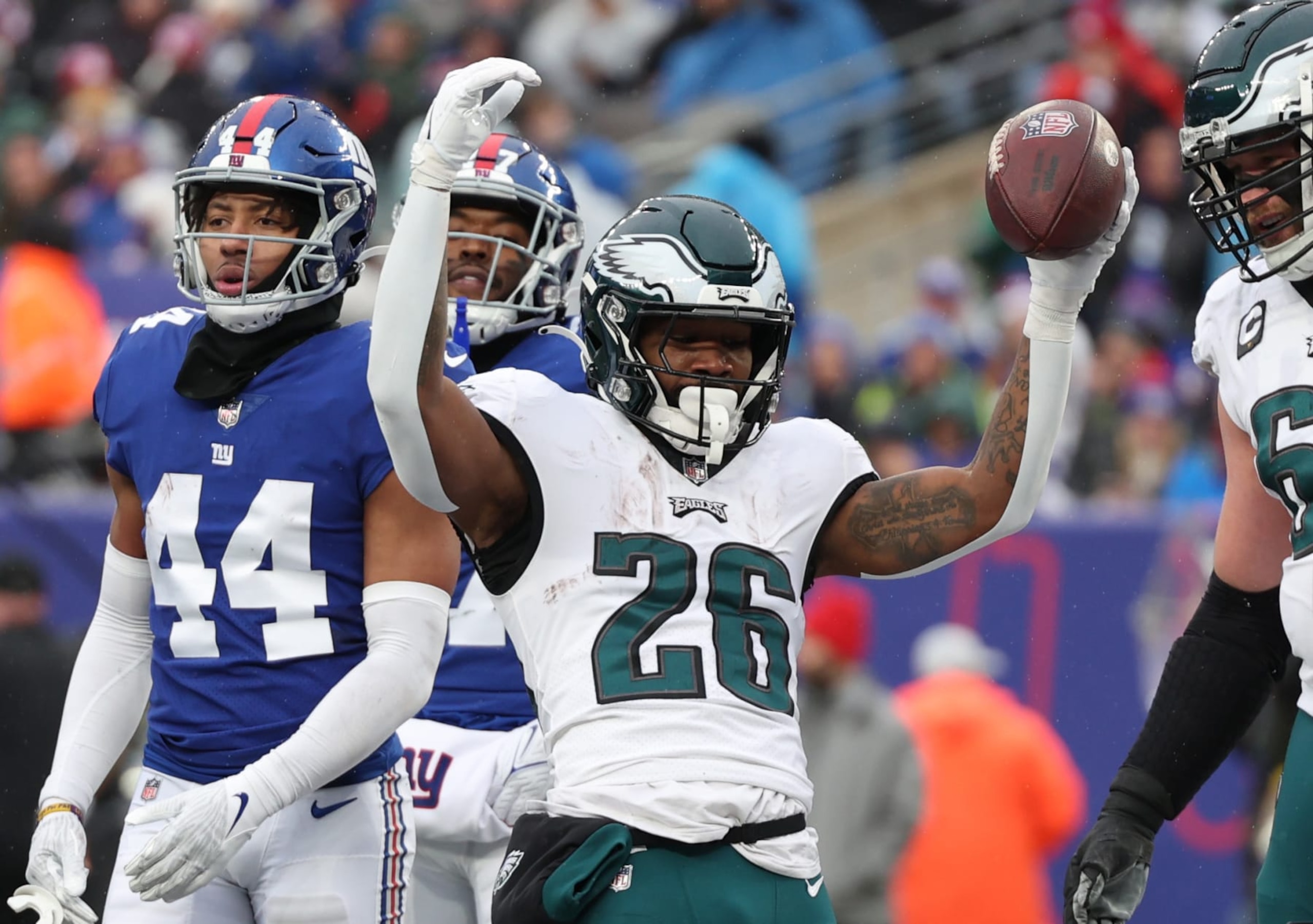EAST RUTHERFORD, NEW JERSEY - DECEMBER 11: Miles Sanders #26 of the Philadelphia Eagles celebrates after a touchdown during the first quarter of the game against the New York Giants at MetLife Stadium on December 11, 2022 in East Rutherford, New Jersey. (Photo by Al Bello/Getty Images)