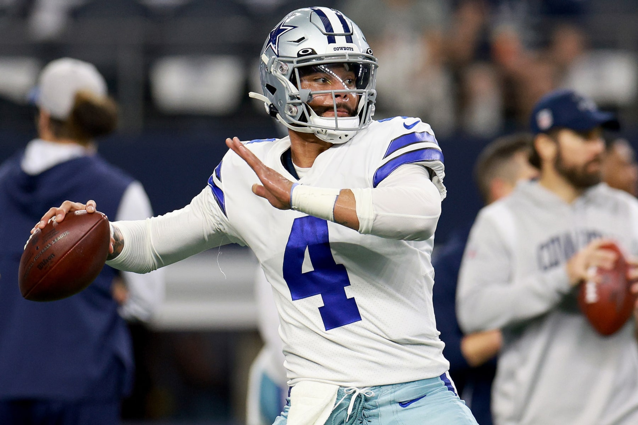 ARLINGTON, TEXAS - DECEMBER 11: Dak Prescott #4 of the Dallas Cowboys warms up prior to a game against the Houston Texans at AT&T Stadium on December 11, 2022 in Arlington, Texas. (Photo by Tom Pennington/Getty Images) ARLINGTON, TEXAS - DECEMBER 11: Dak Prescott #4 of the Dallas Cowboys warms up prior to a game against the Houston Texans at AT&T Stadium on December 11, 2022 in Arlington, Texas. (Photo by Tom Pennington/Getty Images)