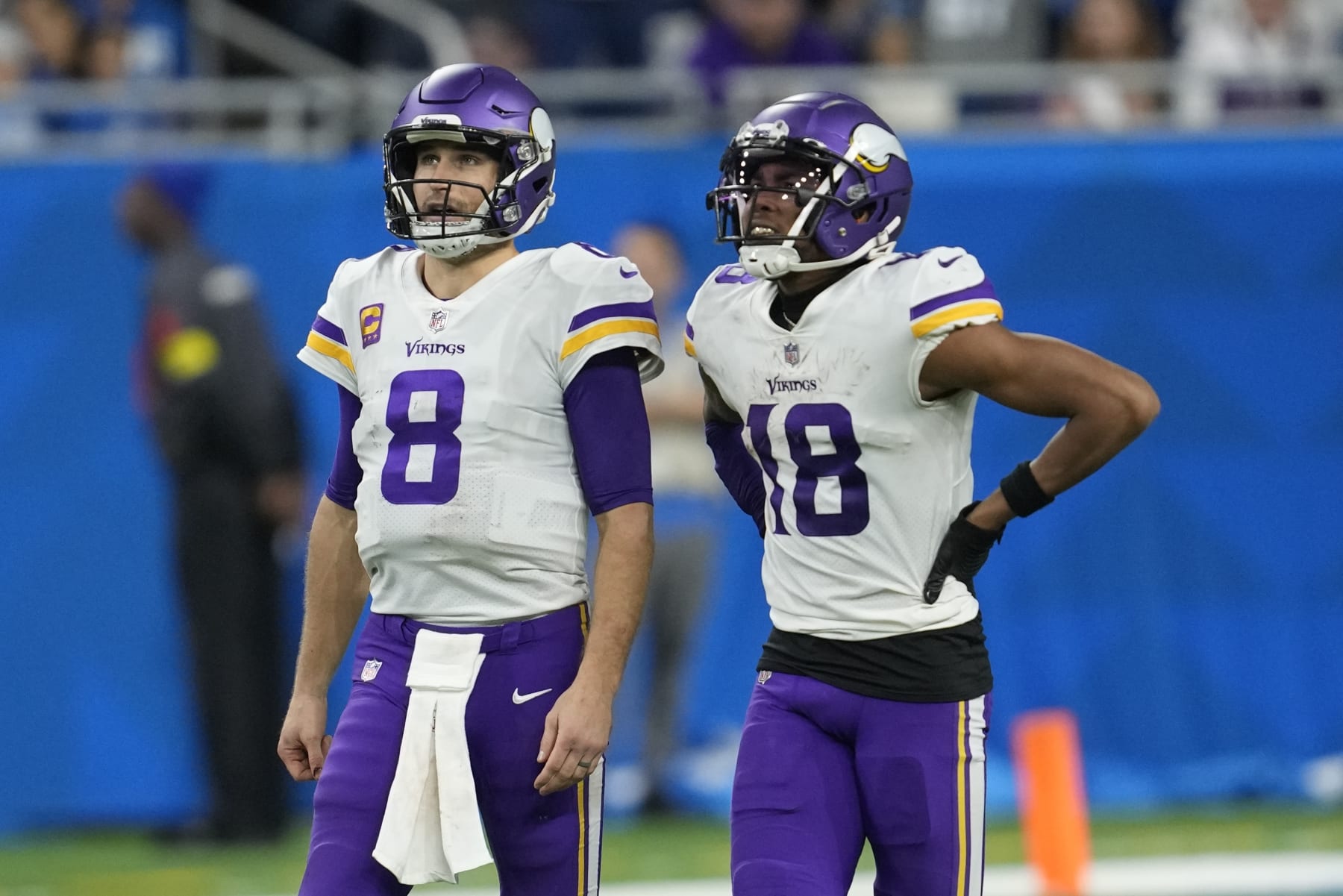 Minnesota Vikings' Kirk Cousins and Justin Jefferson watch a replay during the second half of an NFL football game against the Detroit Lions Sunday, Dec. 11, 2022, in Detroit. (AP Photo/Paul Sancya)