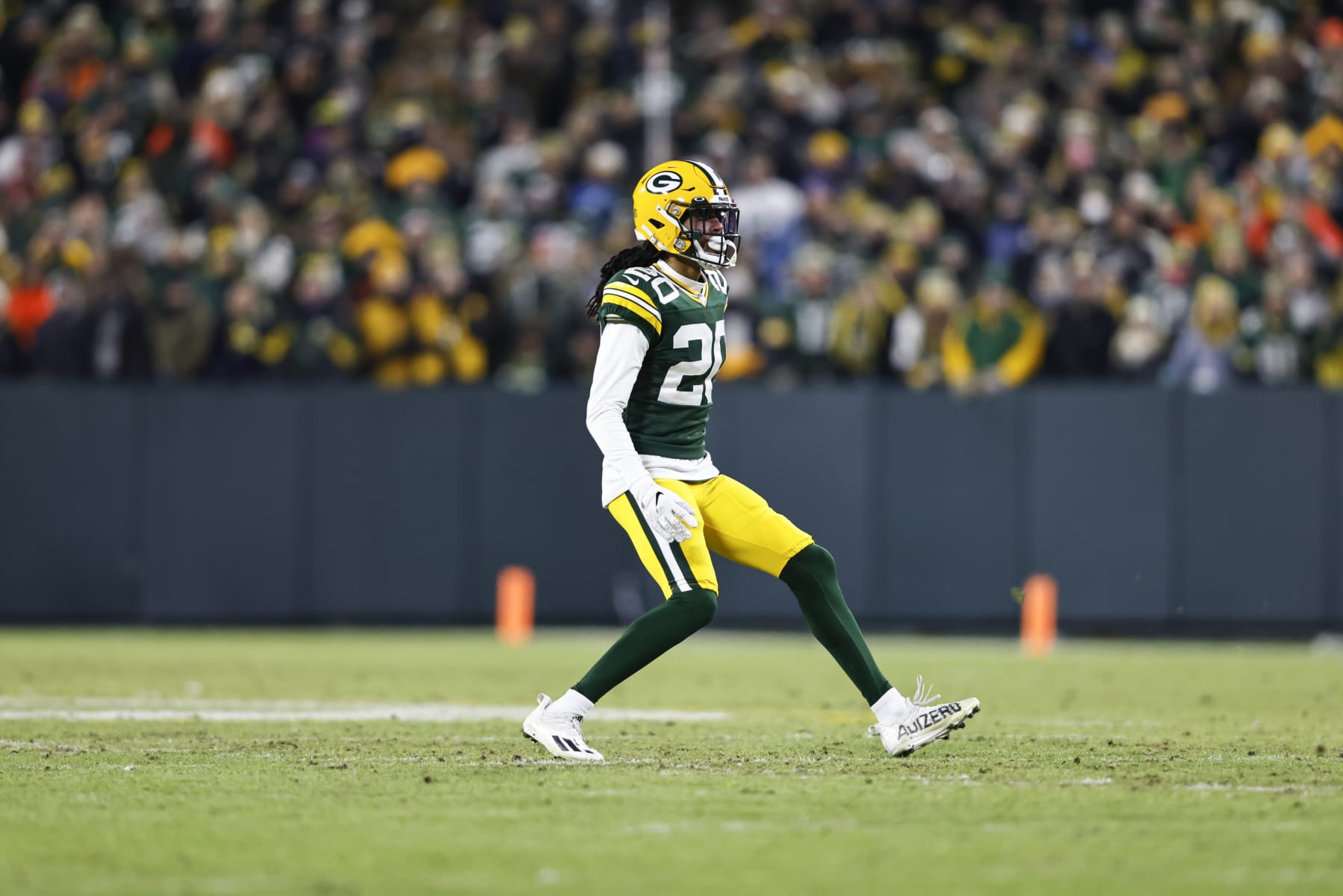 GREEN BAY, WISCONSIN - JANUARY 22: Kevin King #20 of the Green Bay Packers defends as he runs during an NFL divisional playoff football game against the San Francisco 49ers at Lambeau Field on January 22, 2022 in Green Bay, Wisconsin. The 49ers won 13-10. (Photo by Michael Owens/Getty Images)