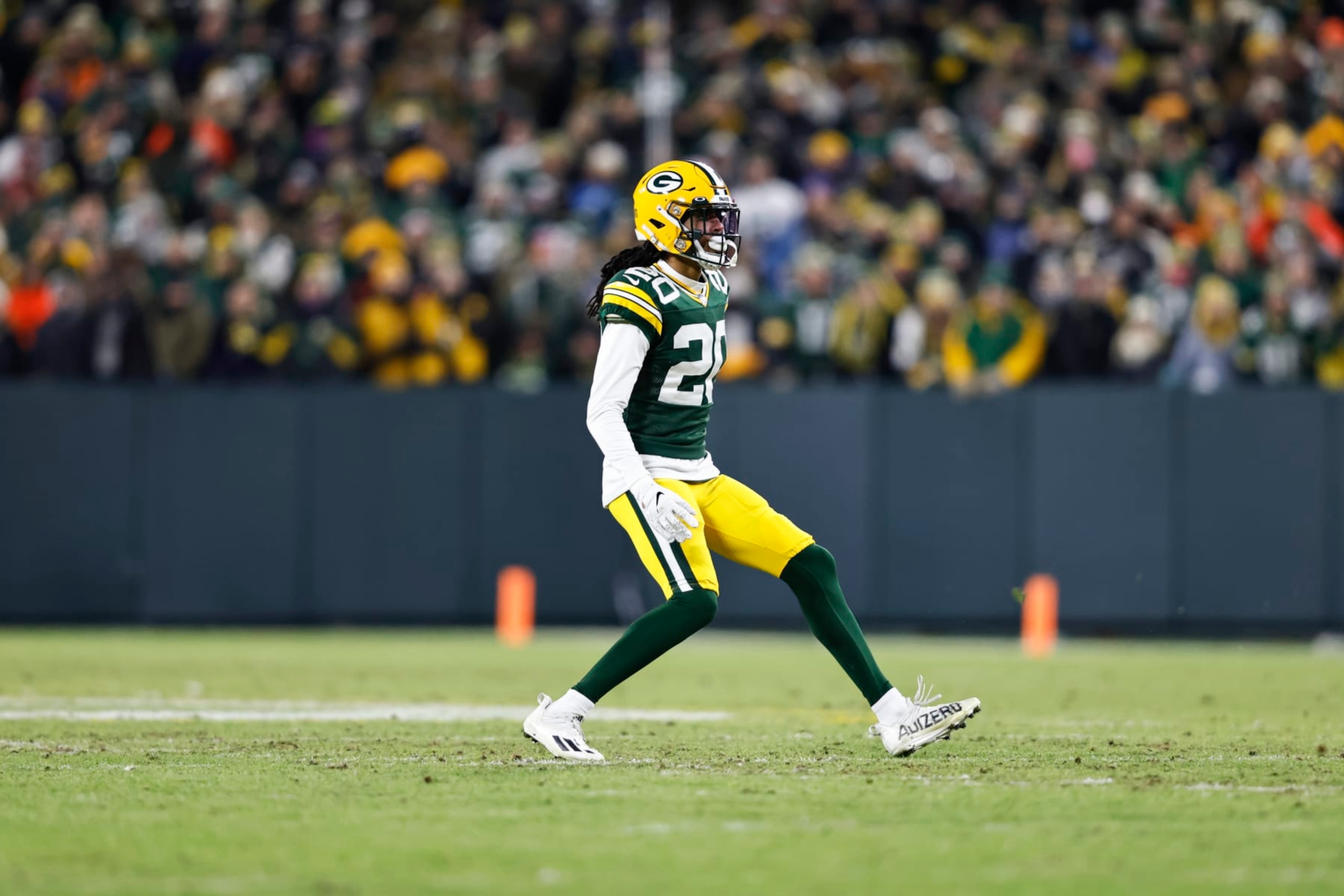 GREEN BAY, WISCONSIN - JANUARY 22: Kevin King #20 of the Green Bay Packers defends as he runs during an NFL divisional playoff football game against the San Francisco 49ers at Lambeau Field on January 22, 2022 in Green Bay, Wisconsin. The 49ers won 13-10. (Photo by Michael Owens/Getty Images)