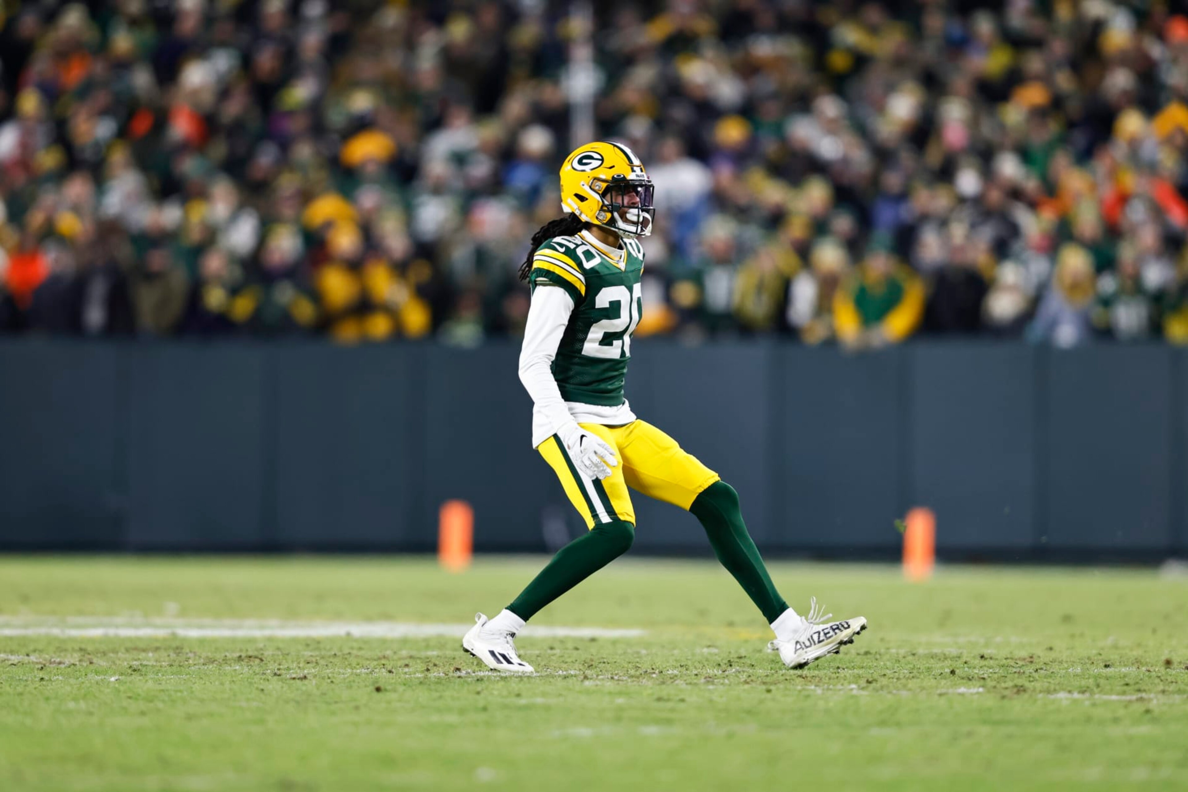 GREEN BAY, WISCONSIN - JANUARY 22: Kevin King #20 of the Green Bay Packers defends as he runs during an NFL divisional playoff football game against the San Francisco 49ers at Lambeau Field on January 22, 2022 in Green Bay, Wisconsin. The 49ers won 13-10. (Photo by Michael Owens/Getty Images)
