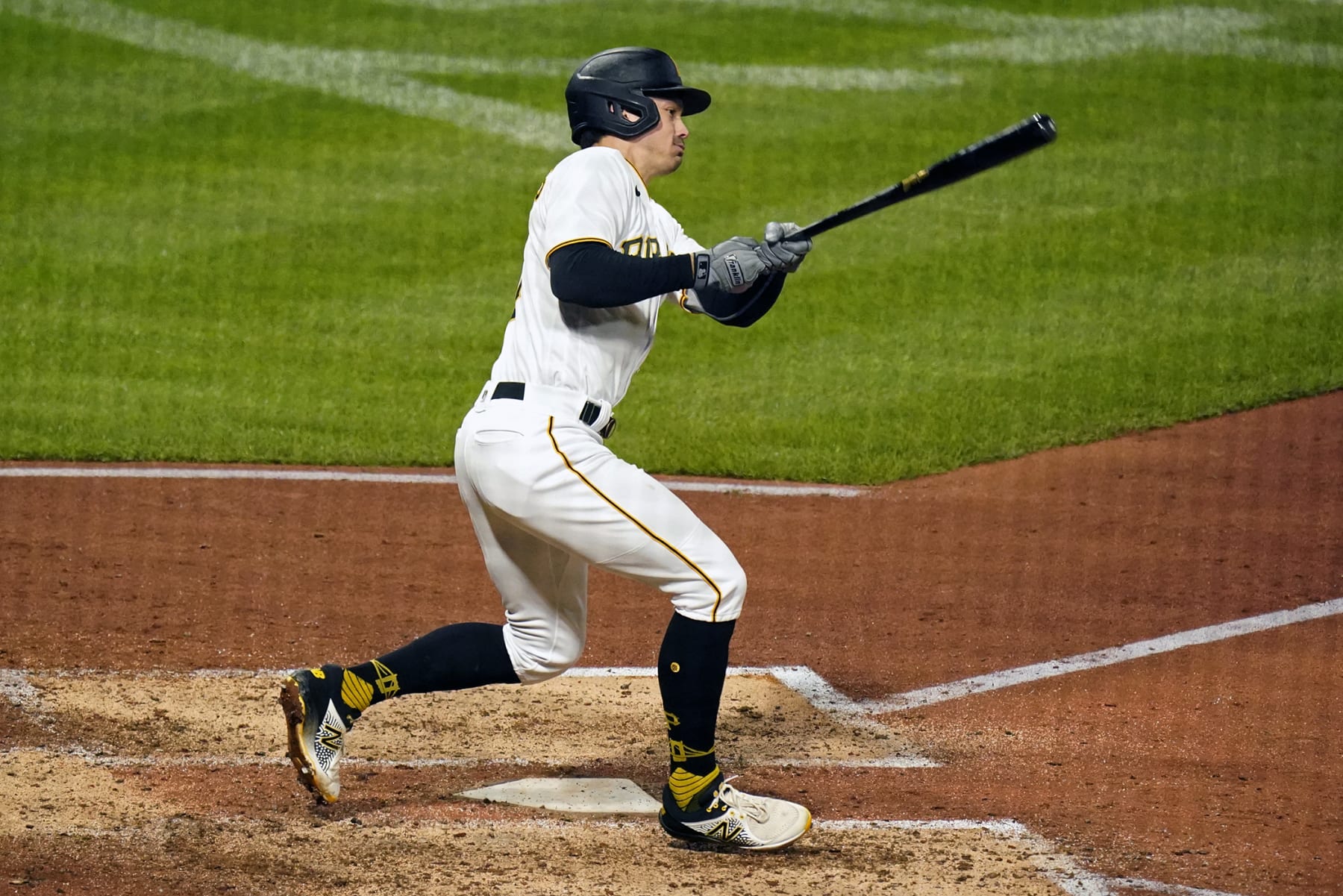 Pittsburgh Pirates' Bryan Reynolds watches his RBI single off New York Mets starting pitcher Taijuan Walker during the fifth inning of a baseball game in Pittsburgh, Tuesday, Sept. 6, 2022. (AP Photo/Gene J. Puskar)