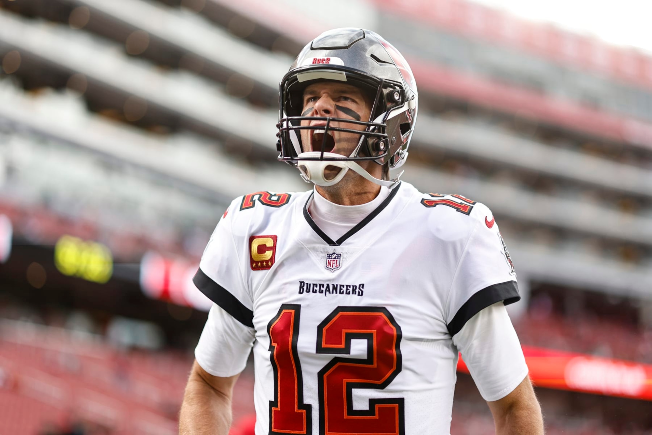 SANTA CLARA, CALIFORNIA - DECEMBER 11: Tom Brady #12 of the Tampa Bay Buccaneers reacts prior to an NFL football game between the San Francisco 49ers and the Tampa Bay Buccaneers at Levi's Stadium on December 11, 2022 in Santa Clara, California. (Photo by Michael Owens/Getty Images) SANTA CLARA, CALIFORNIA - DECEMBER 11: Tom Brady #12 of the Tampa Bay Buccaneers reacts prior to an NFL football game between the San Francisco 49ers and the Tampa Bay Buccaneers at Levi's Stadium on December 11, 2022 in Santa Clara, California. (Photo by Michael Owens/Getty Images)