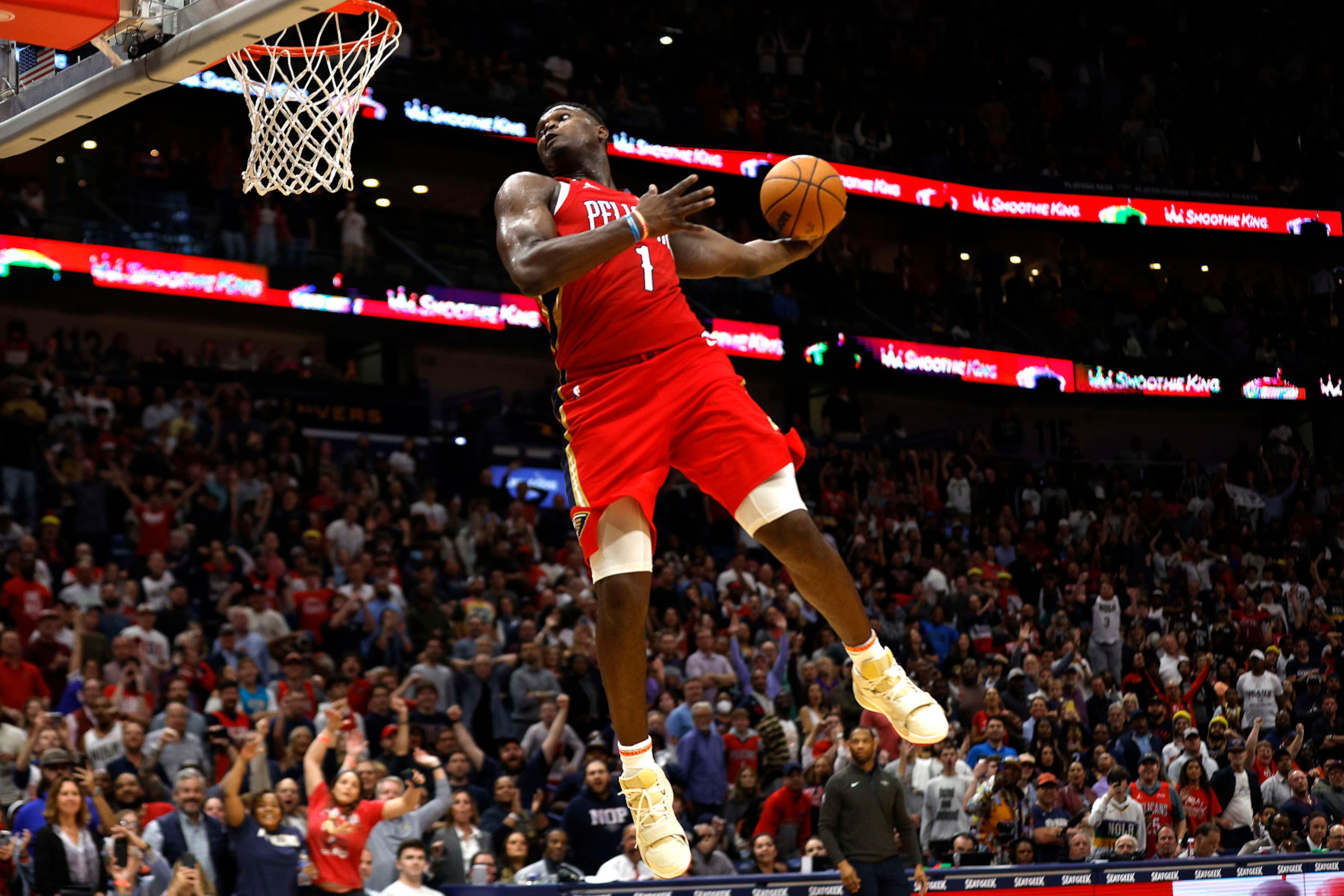 NEW ORLEANS, LOUISIANA - DECEMBER 09: Zion Williamson #1 of the New Orleans Pelicans dunks the ball during the fourth quarter of an NBA game against the Phoenix Suns at Smoothie King Center on December 09, 2022 in New Orleans, Louisiana. NOTE TO USER: User expressly acknowledges and agrees that, by downloading and or using this photograph, User is consenting to the terms and conditions of the Getty Images License Agreement. (Photo by Sean Gardner/Getty Images) NEW ORLEANS, LOUISIANA - DECEMBER 09: Zion Williamson #1 of the New Orleans Pelicans dunks the ball during the fourth quarter of an NBA game against the Phoenix Suns at Smoothie King Center on December 09, 2022 in New Orleans, Louisiana. NOTE TO USER: User expressly acknowledges and agrees that, by downloading and or using this photograph, User is consenting to the terms and conditions of the Getty Images License Agreement. (Photo by Sean Gardner/Getty Images)