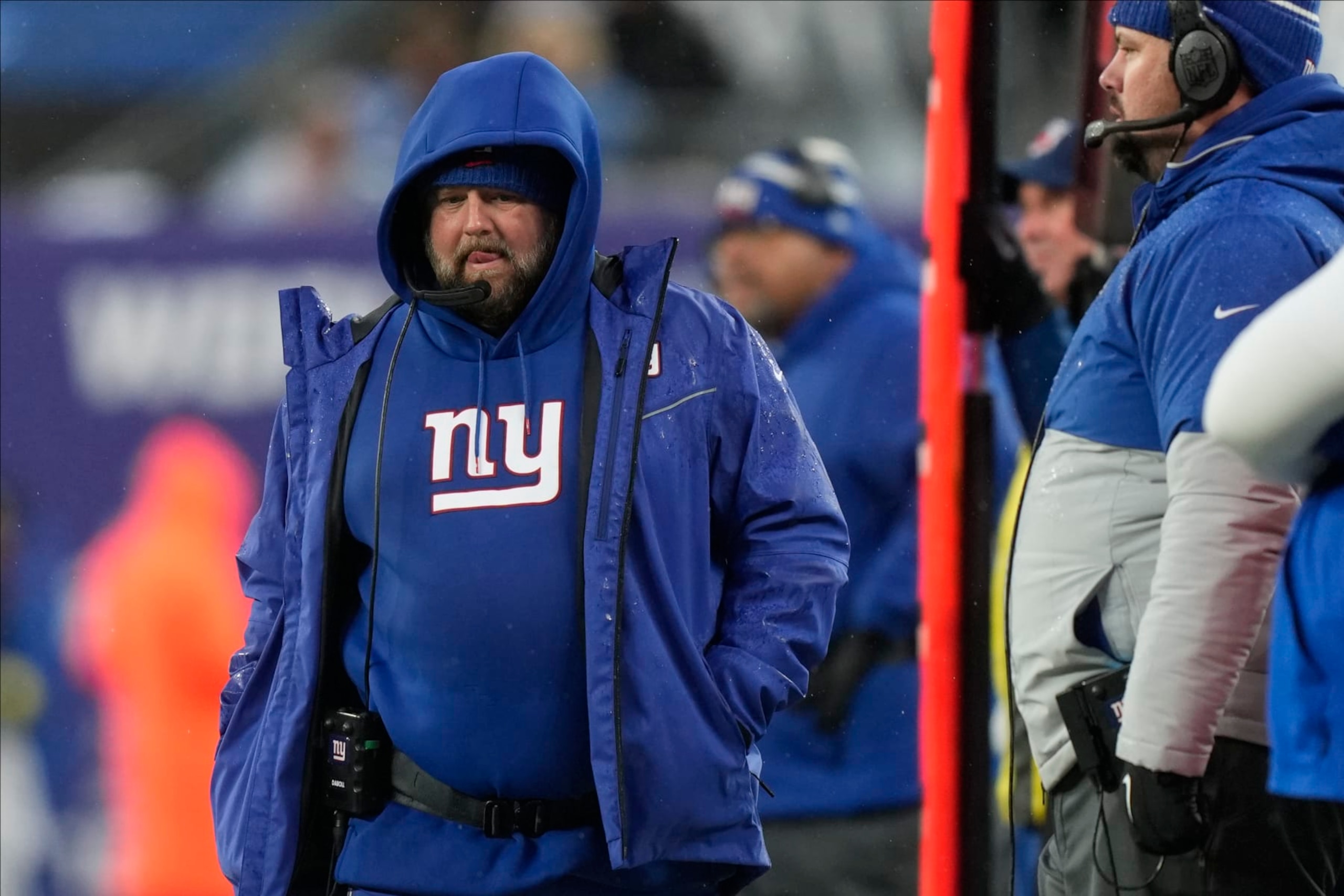 New York Giants head coach Brian Daboll walks the sidelines during the fourth quarter of an NFL football game against the Philadelphia Eagles, Sunday, Dec. 11, 2022, in East Rutherford, N.J. (AP Photo/Bryan Woolston)