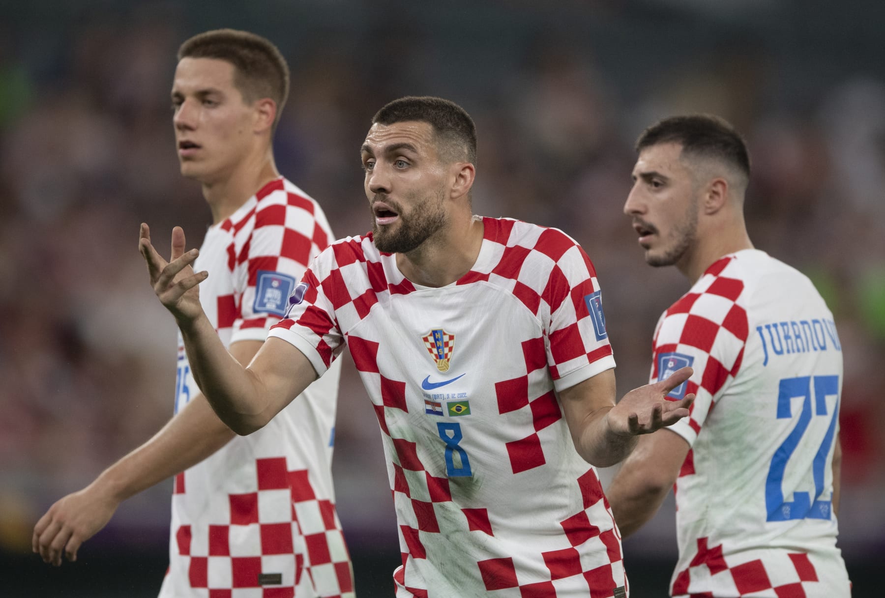 AL RAYYAN, QATAR - DECEMBER 09: Mateo Kovacic, Mario Pasalic and Josip Juranovic of Croatia during the FIFA World Cup Qatar 2022 quarter final match between Croatia and Brazil at Education City Stadium on December 9, 2022 in Al Rayyan, Qatar. (Photo by Visionhaus/Getty Images)