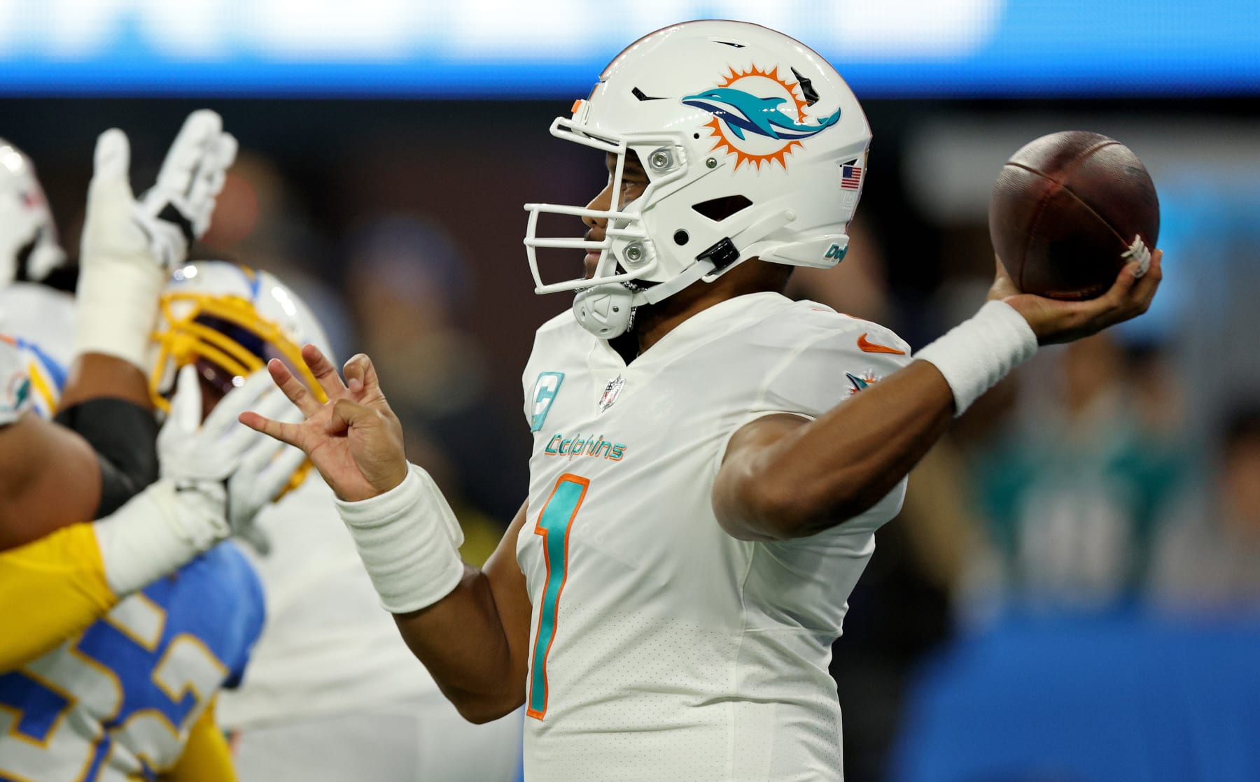 INGLEWOOD, CALIFORNIA - DECEMBER 11: Tua Tagovailoa #1 of the Miami Dolphins passes during a game against the Los Angeles Chargers at SoFi Stadium on December 11, 2022 in Inglewood, California. (Photo by Harry How/Getty Images)