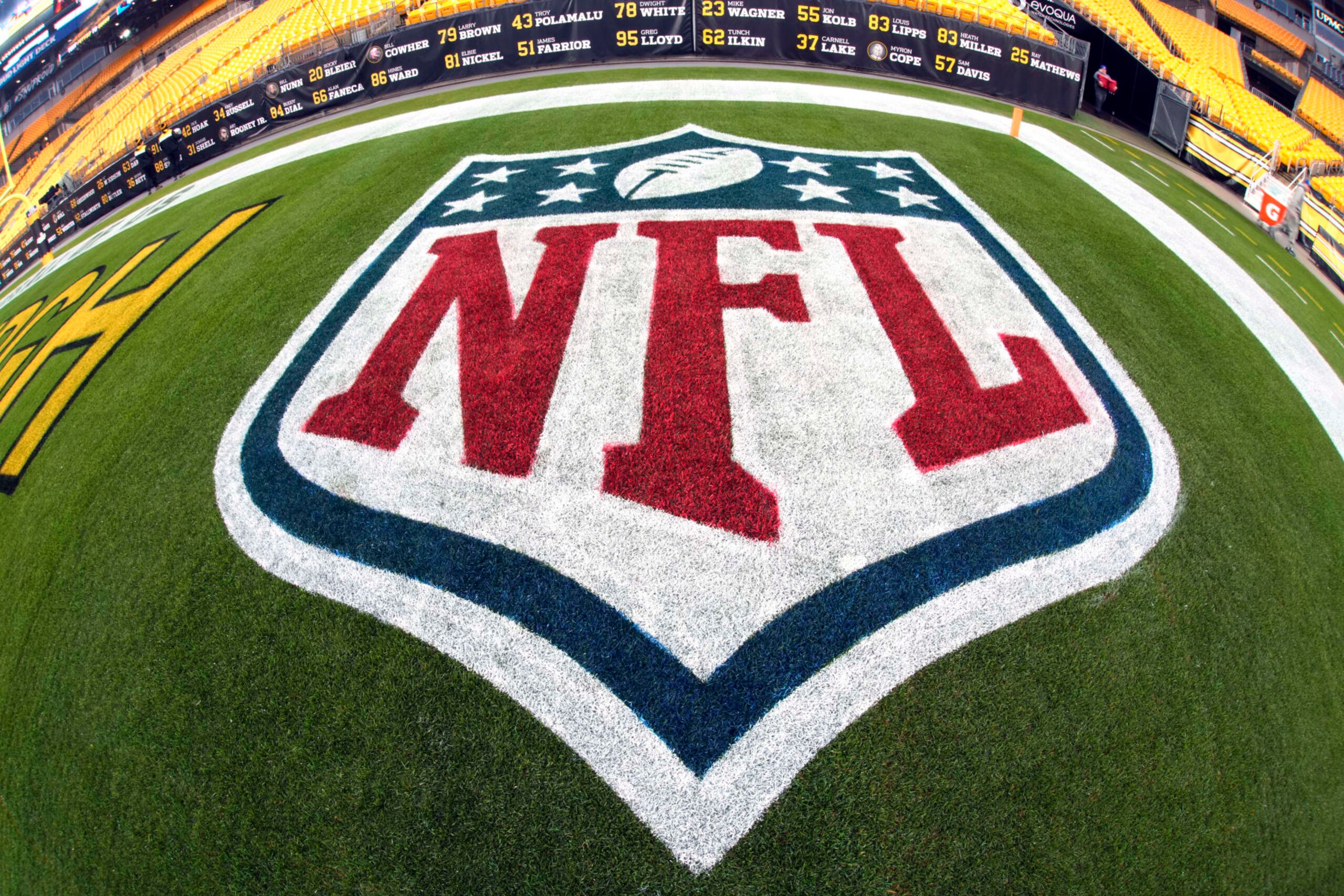 The NFL logo is painted in the end zone at Acrisure Stadium before an NFL football game between the Pittsburgh Steelers and the Baltimore Ravens in Pittsburgh, Sunday, Dec. 11, 2022. (AP Photo/Gene J. Puskar)