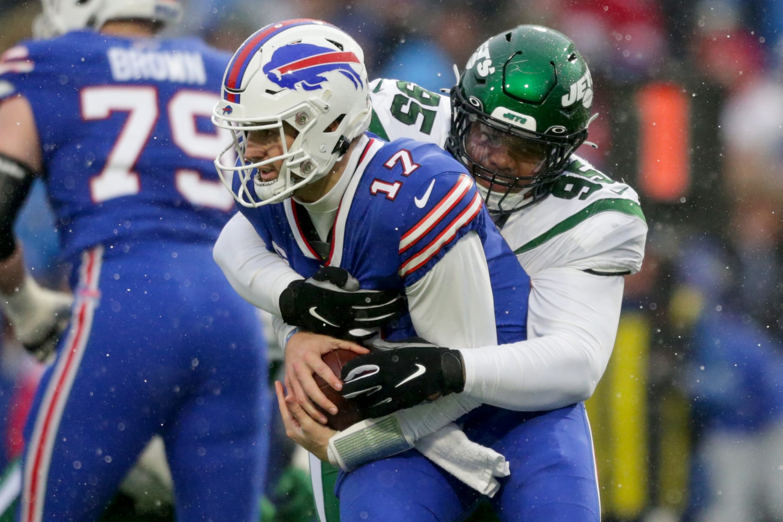 ORCHARD PARK, NEW YORK - DECEMBER 11: Quinnen Williams #95 of the New York Jets sacks Josh Allen #17 of the Buffalo Bills in the first quarter at Highmark Stadium on December 11, 2022 in Orchard Park, New York. (Photo by Joshua Bessex/Getty Images)