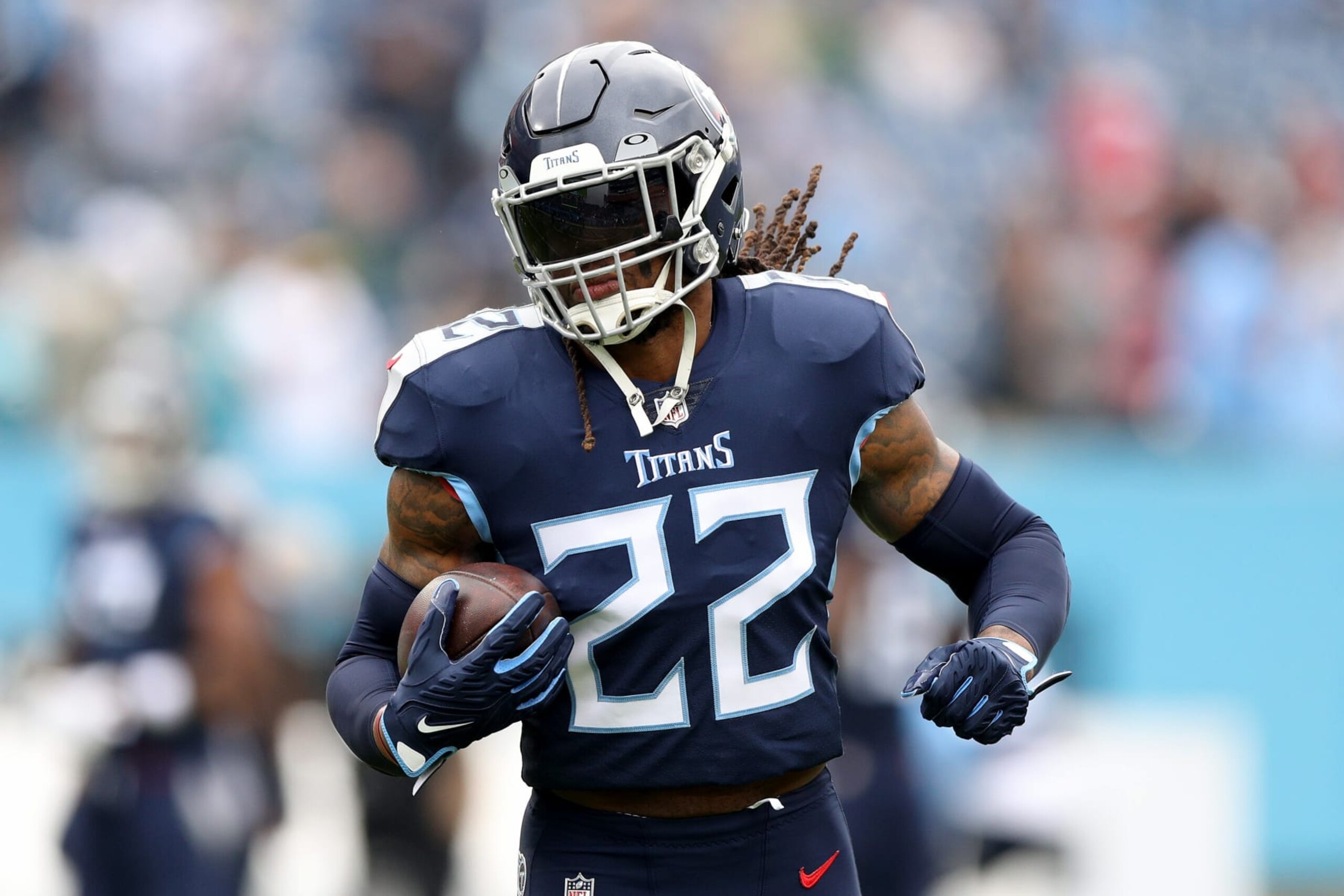 NASHVILLE, TENNESSEE - DECEMBER 11: Derrick Henry #22 of the Tennessee Titans warms up prior to the game against the Jacksonville Jaguars at Nissan Stadium on December 11, 2022 in Nashville, Tennessee. (Photo by Justin Ford/Getty Images)