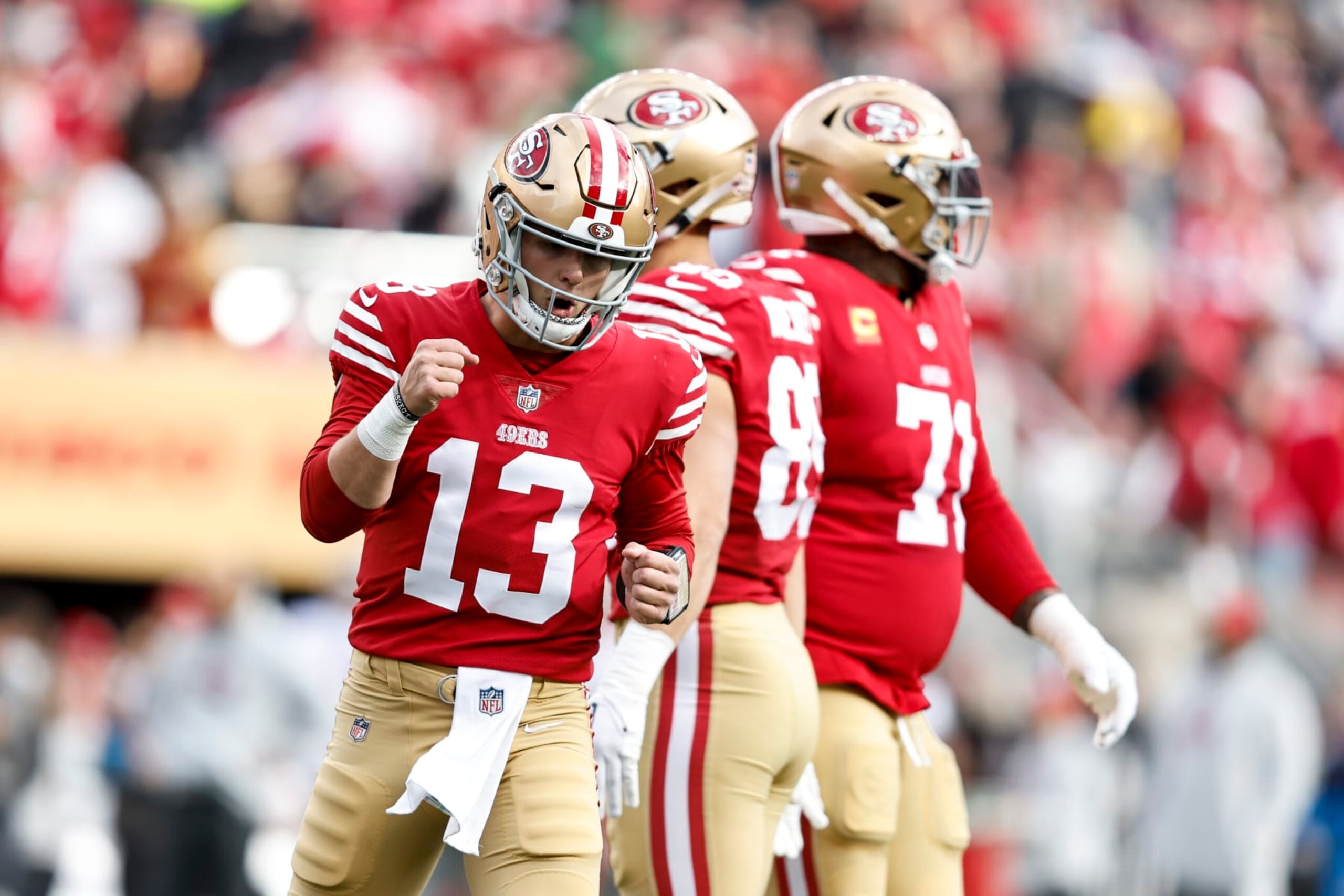 SANTA CLARA, CALIFORNIA - DECEMBER 11: Brock Purdy #13 of the San Francisco 49ers celebrates after passing for a touchdown during an NFL football game between the San Francisco 49ers and the Tampa Bay Buccaneers at Levi's Stadium on December 11, 2022 in Santa Clara, California. (Photo by Michael Owens/Getty Images)