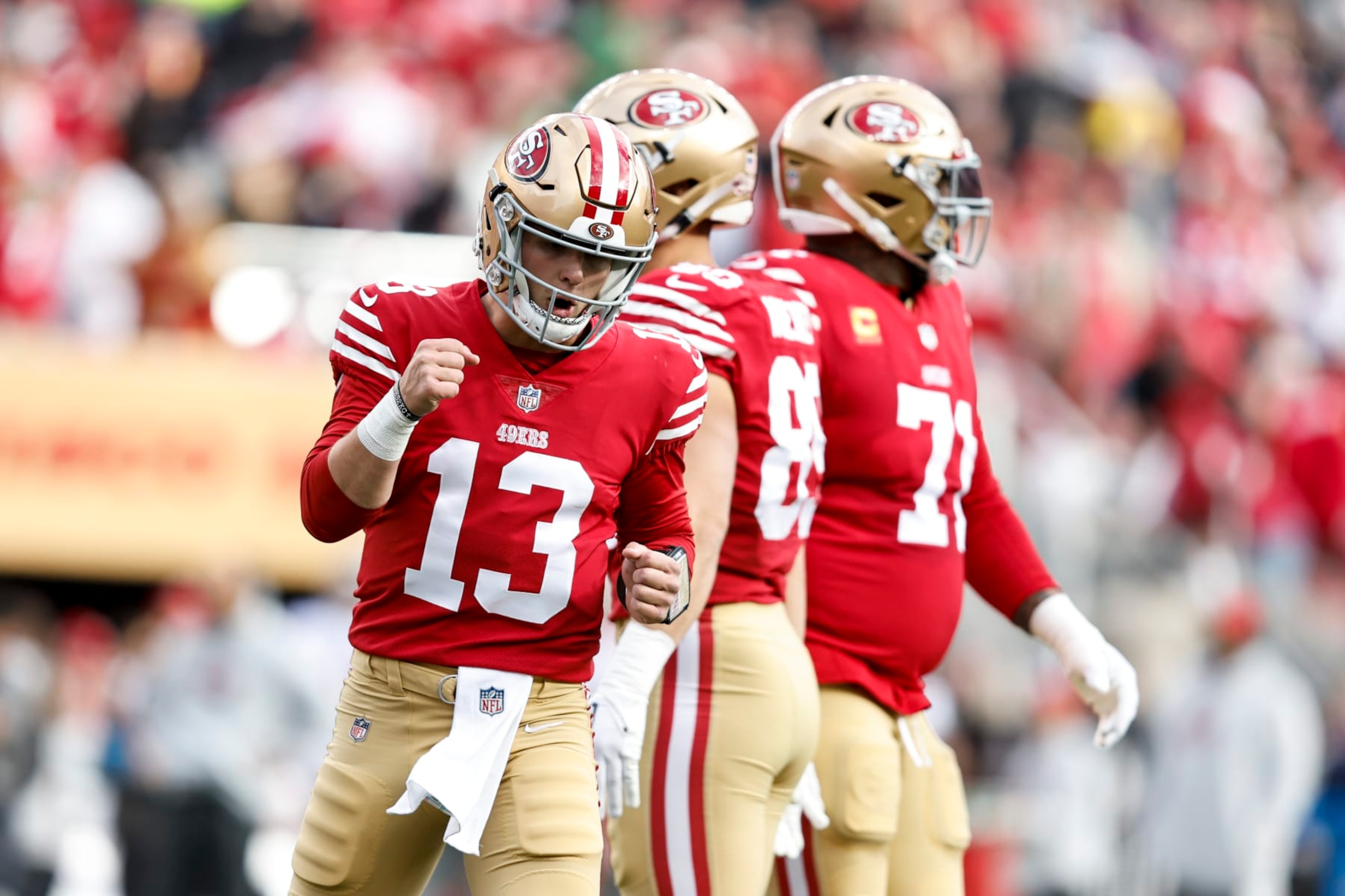 SANTA CLARA, CALIFORNIA - DECEMBER 11: Brock Purdy #13 of the San Francisco 49ers celebrates after passing for a touchdown during an NFL football game between the San Francisco 49ers and the Tampa Bay Buccaneers at Levi's Stadium on December 11, 2022 in Santa Clara, California. (Photo by Michael Owens/Getty Images)