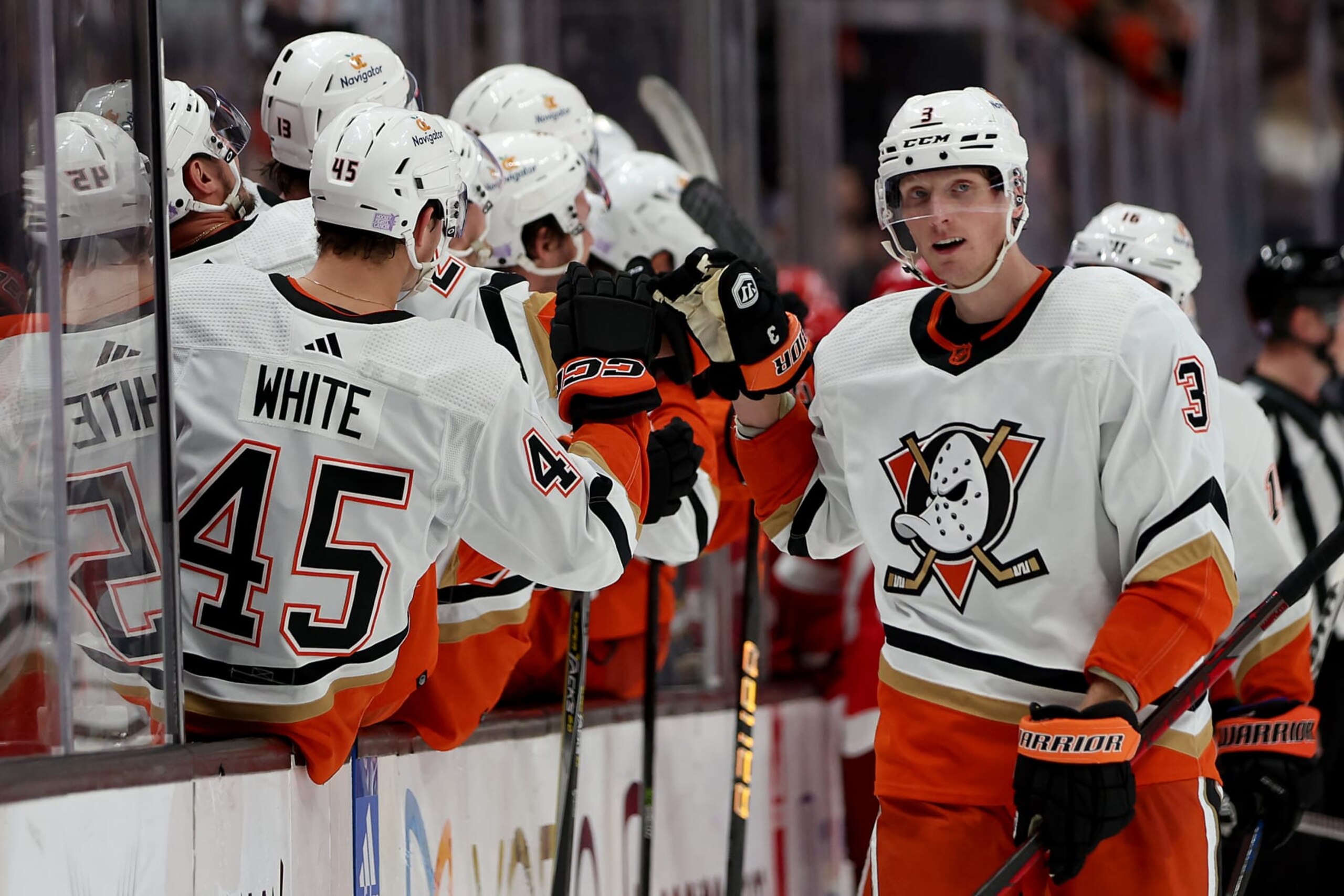 ANAHEIM, CALIFORNIA - NOVEMBER 15: John Klingberg #3 of the Anaheim Ducks is congratulated at the bench after scoring a goal during the third period of a game against the Detroit Red Wings at Honda Center on November 15, 2022 in Anaheim, California. (Photo by Sean M. Haffey/Getty Images)