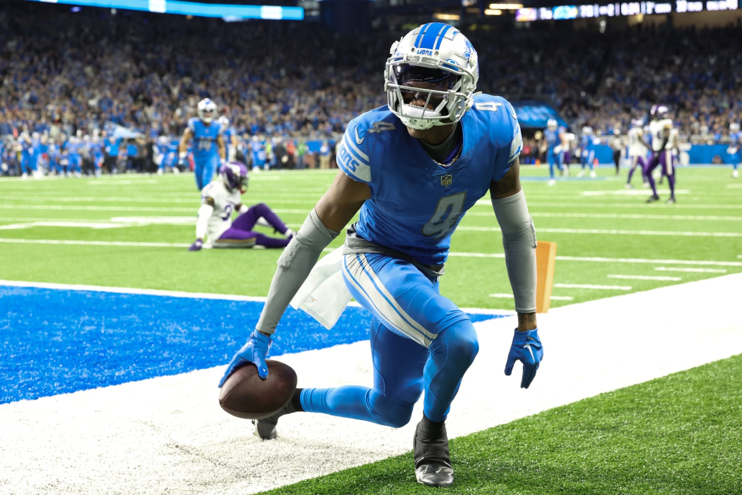 DETROIT, MICHIGAN - DECEMBER 11: DJ Chark #4 of the Detroit Lions celebrates after scoring a touchdown during the second quarter of the game against the Minnesota Vikings at Ford Field on December 11, 2022 in Detroit, Michigan. (Photo by Rey Del Rio/Getty Images) DETROIT, MICHIGAN - DECEMBER 11: DJ Chark #4 of the Detroit Lions celebrates after scoring a touchdown during the second quarter of the game against the Minnesota Vikings at Ford Field on December 11, 2022 in Detroit, Michigan. (Photo by Rey Del Rio/Getty Images)