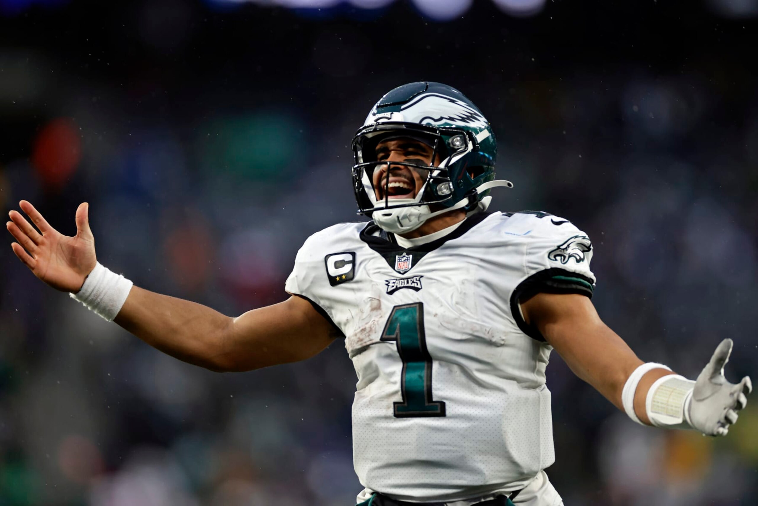 Philadelphia Eagles quarterback Jalen Hurts (1) reacts after a touchdown against the New York Giants during an NFL football game Sunday, Dec. 11, 2022, in East Rutherford, N.J. (AP Photo/Adam Hunger)