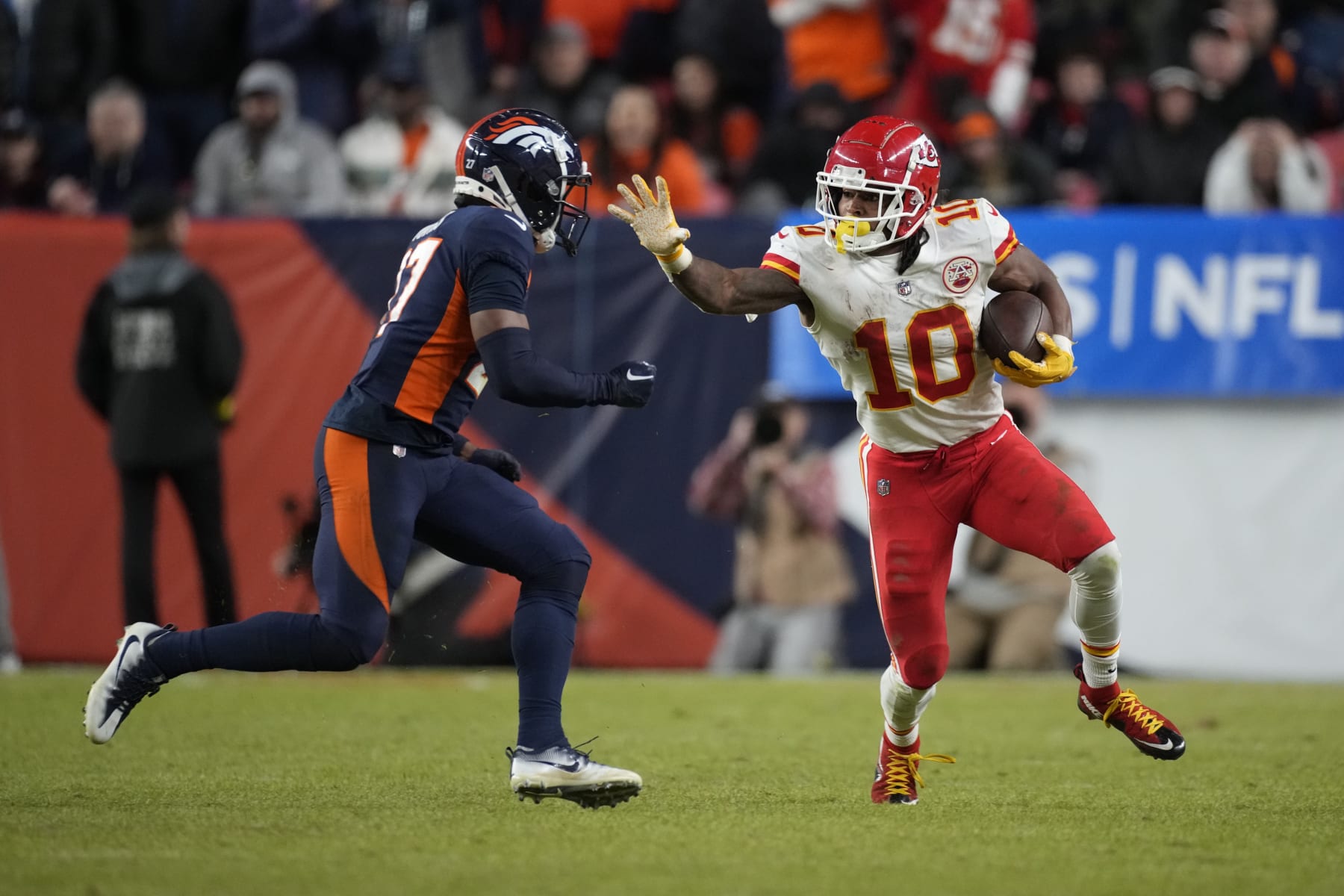 Kansas City Chiefs running back Isiah Pacheco (10) runs during the second half of an NFL football game against the Denver Broncos Sunday, Dec. 11, 2022, in Denver. (AP Photo/David Zalubowski)