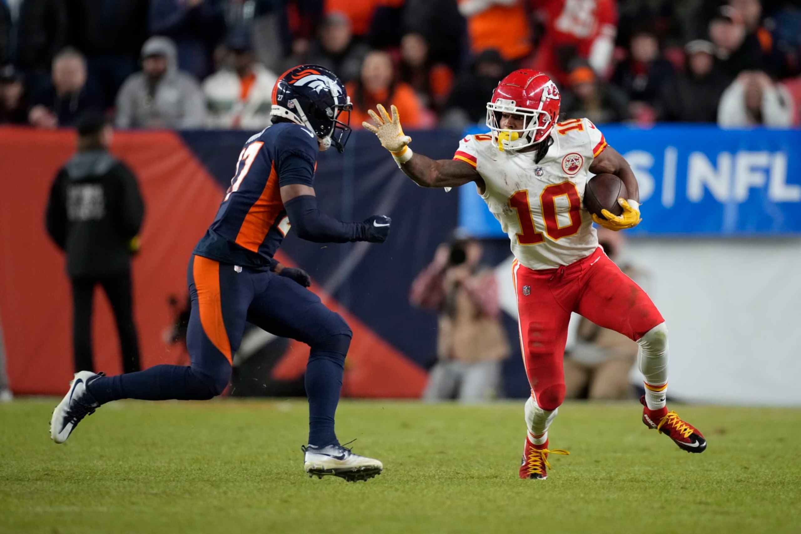 Kansas City Chiefs running back Isiah Pacheco (10) runs during the second half of an NFL football game against the Denver Broncos Sunday, Dec. 11, 2022, in Denver. (AP Photo/David Zalubowski)