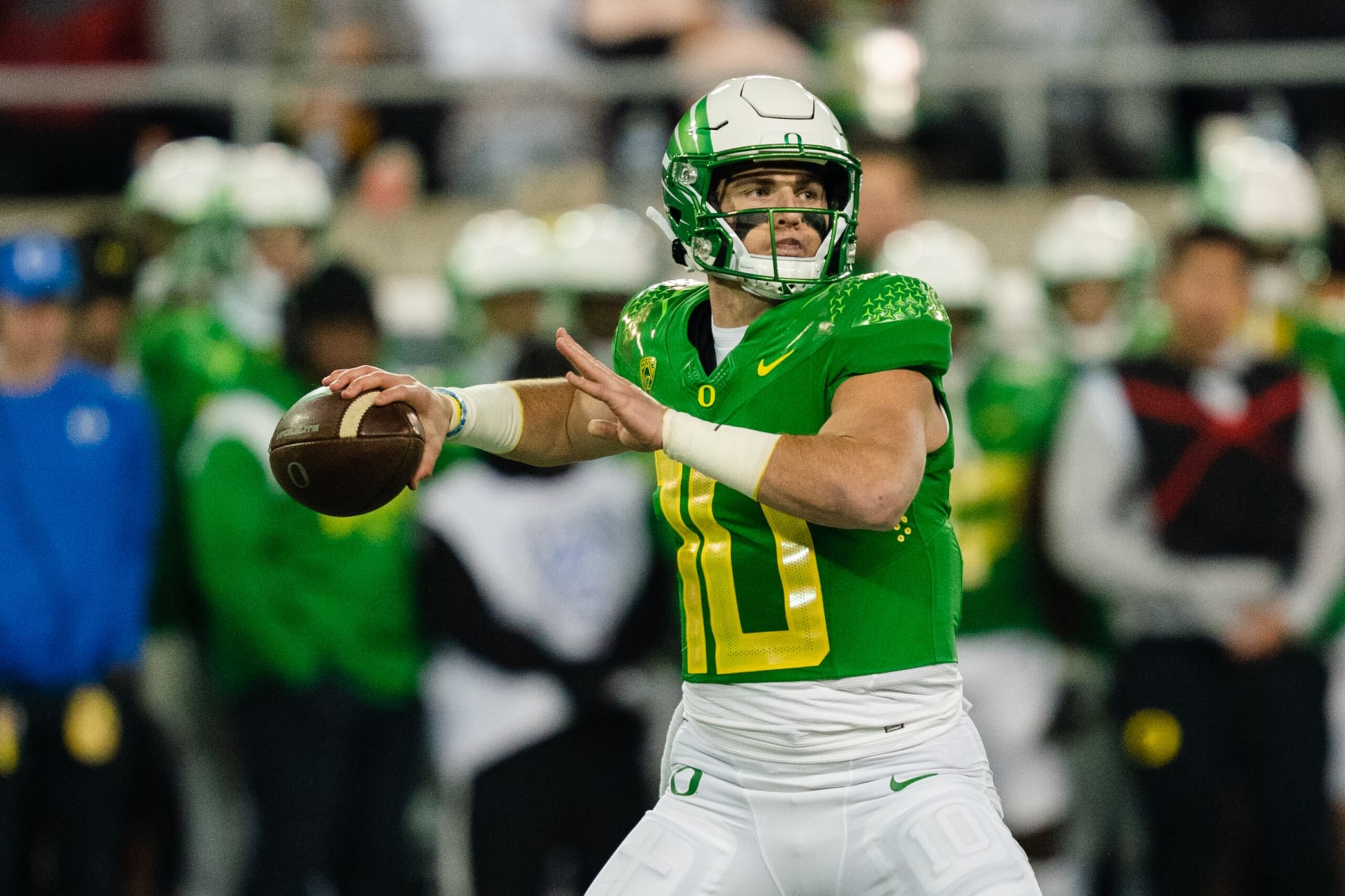 EUGENE, OR - NOVEMBER 19:  Quarterback Bo Nix #10 of the Oregon Ducks prepares to throw a pass during the first quarter of the game against the Utah Utes at Autzen Stadium on November 19, 2022 in Eugene, Oregon. (Photo by Ali Gradischer/Getty Images)
