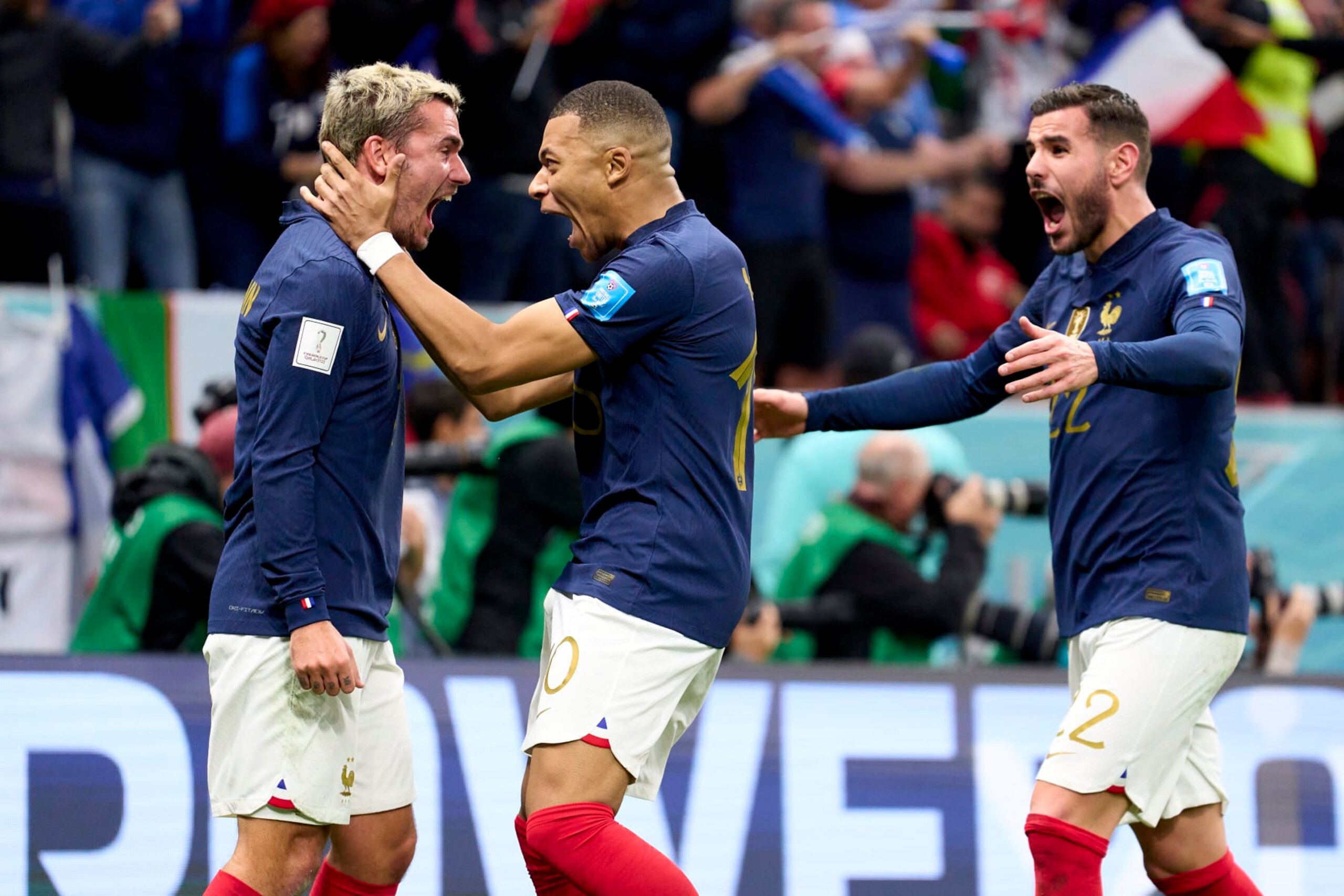 AL KHOR, QATAR - DECEMBER 10: Antoine Griezmann, Kylian Mbappe and Theo Hernandez of France celebrates after the second goal of his team scored by Olivier Giroud (not in frame) during the FIFA World Cup Qatar 2022 quarter final match between England and France at Al Bayt Stadium on December 10, 2022 in Al Khor, Qatar. (Photo by Juan Luis Diaz/Quality Sport Images/Getty Images)